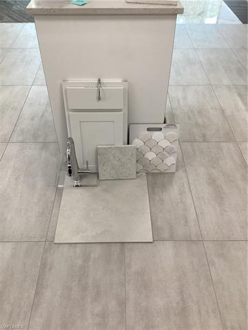 3974 East Hampton Circle Fort Myers, FL 33905 - Photo 8 of 36 a bathroom with a sink and vanity