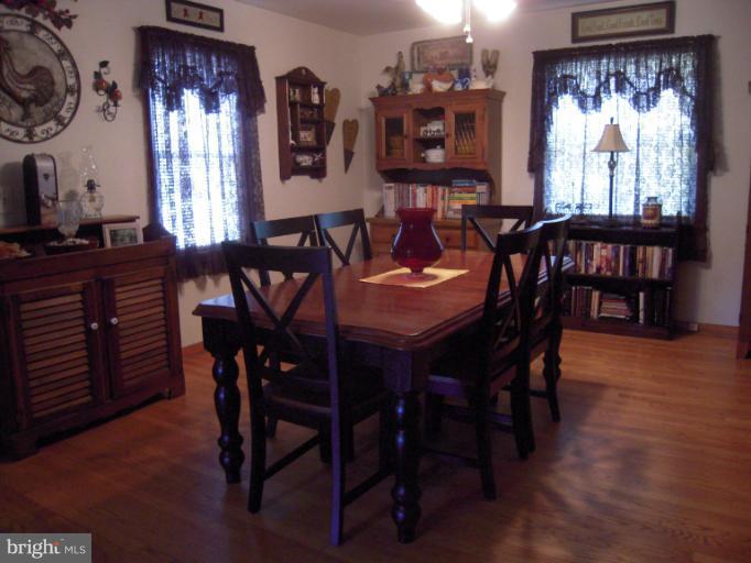 204 Dutrow Road Westminster, MD 21157 - Photo 5 of 16 a view of a dining room with furniture window and wooden floor