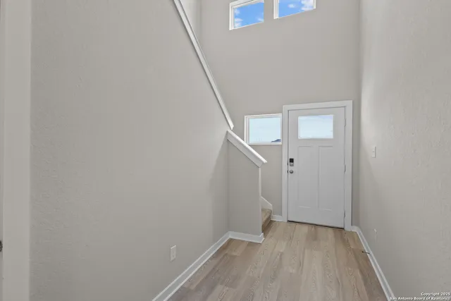 a view of hallway with stairs