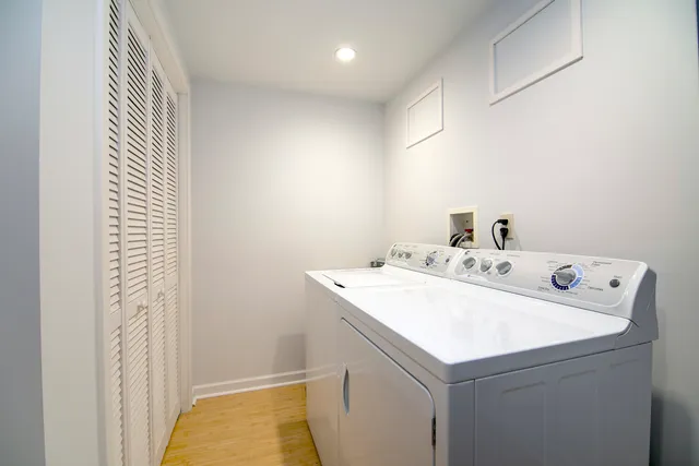 an aerial view of a house with a yard swimming pool and outdoor seating