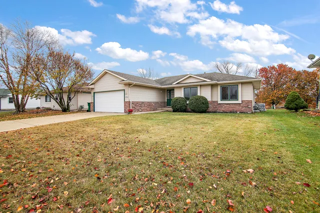 a view of a livingroom with wooden floor