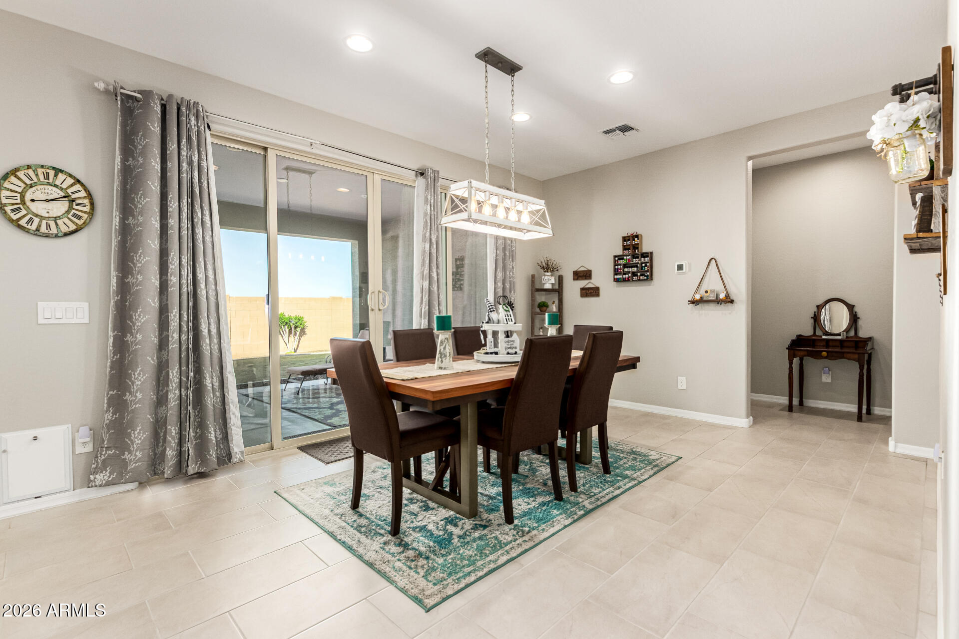 22494 East Russet Road Queen Creek, AZ 85142 - Photo 12 of 43 a view of a dining room with furniture