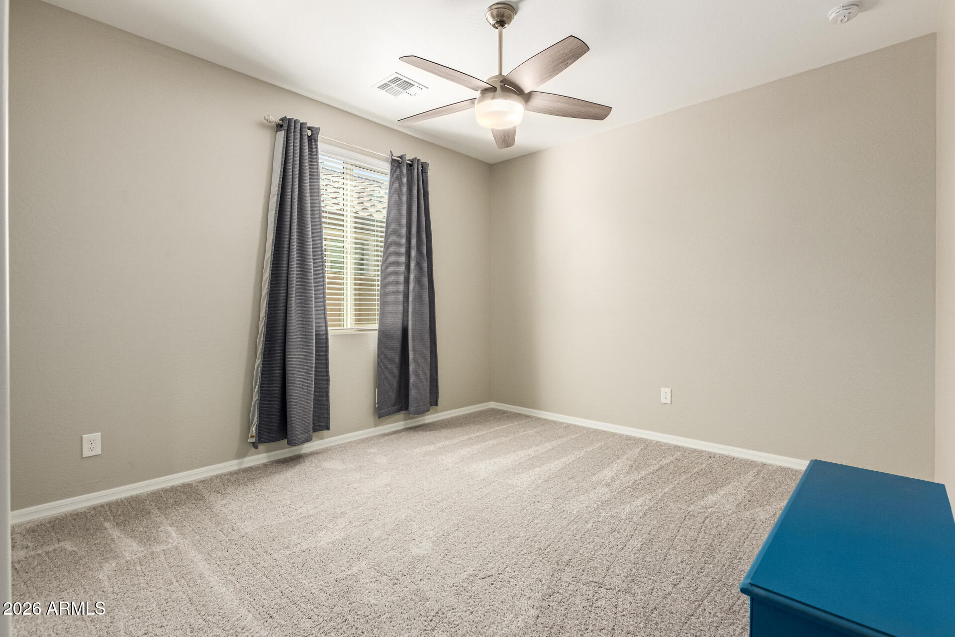 22494 East Russet Road Queen Creek, AZ 85142 - Photo 28 of 43 an empty room with windows and fan