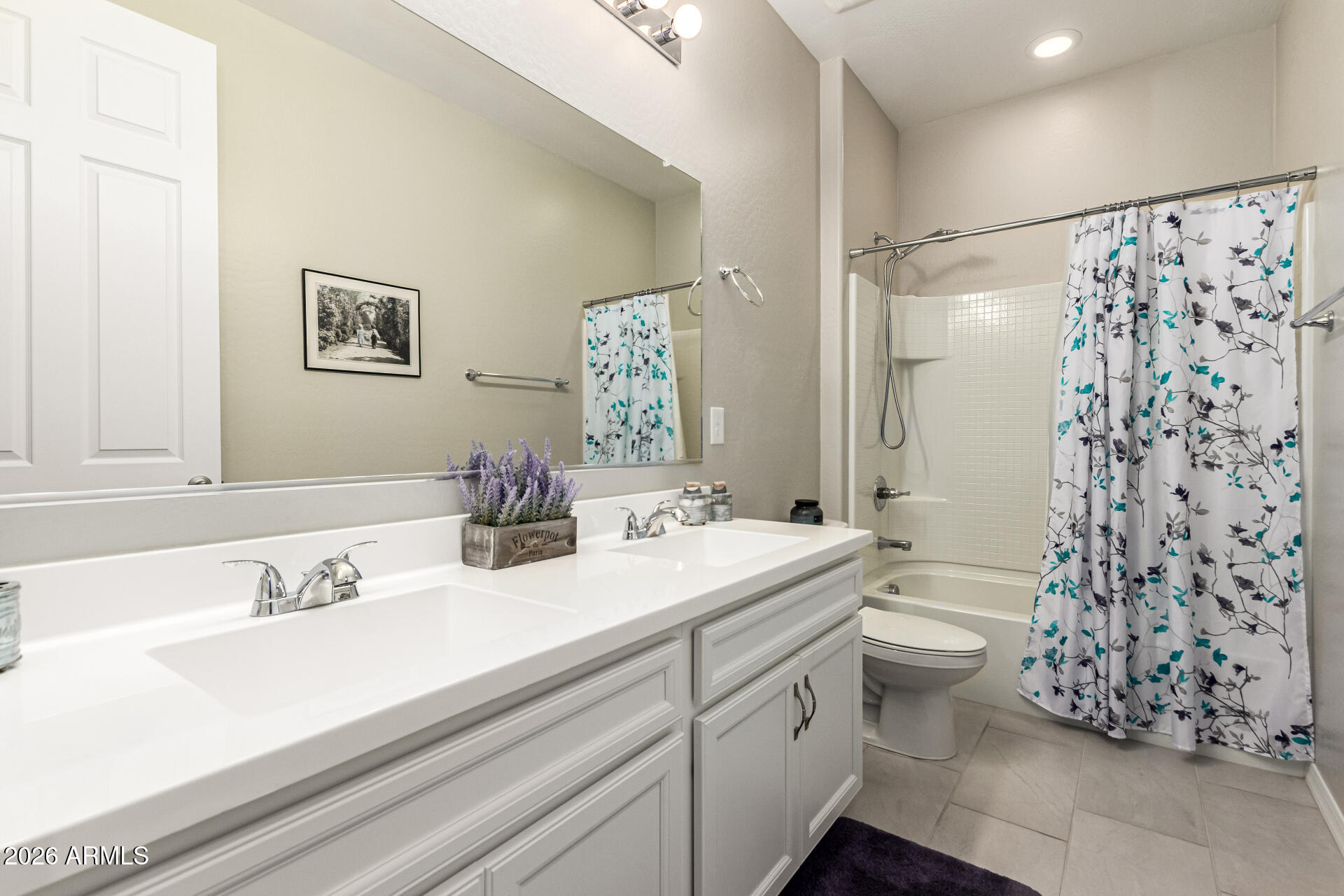 22494 East Russet Road Queen Creek, AZ 85142 - Photo 33 of 43 a bathroom with a double vanity sink mirror and shower