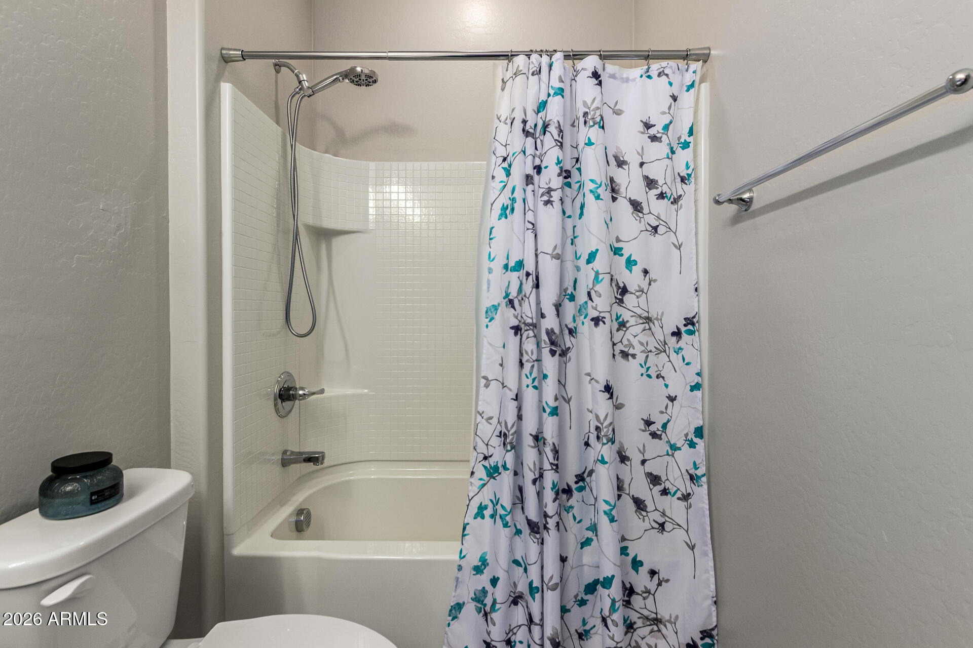 22494 East Russet Road Queen Creek, AZ 85142 - Photo 34 of 43 a bathroom with a shower curtain and a shower curtain