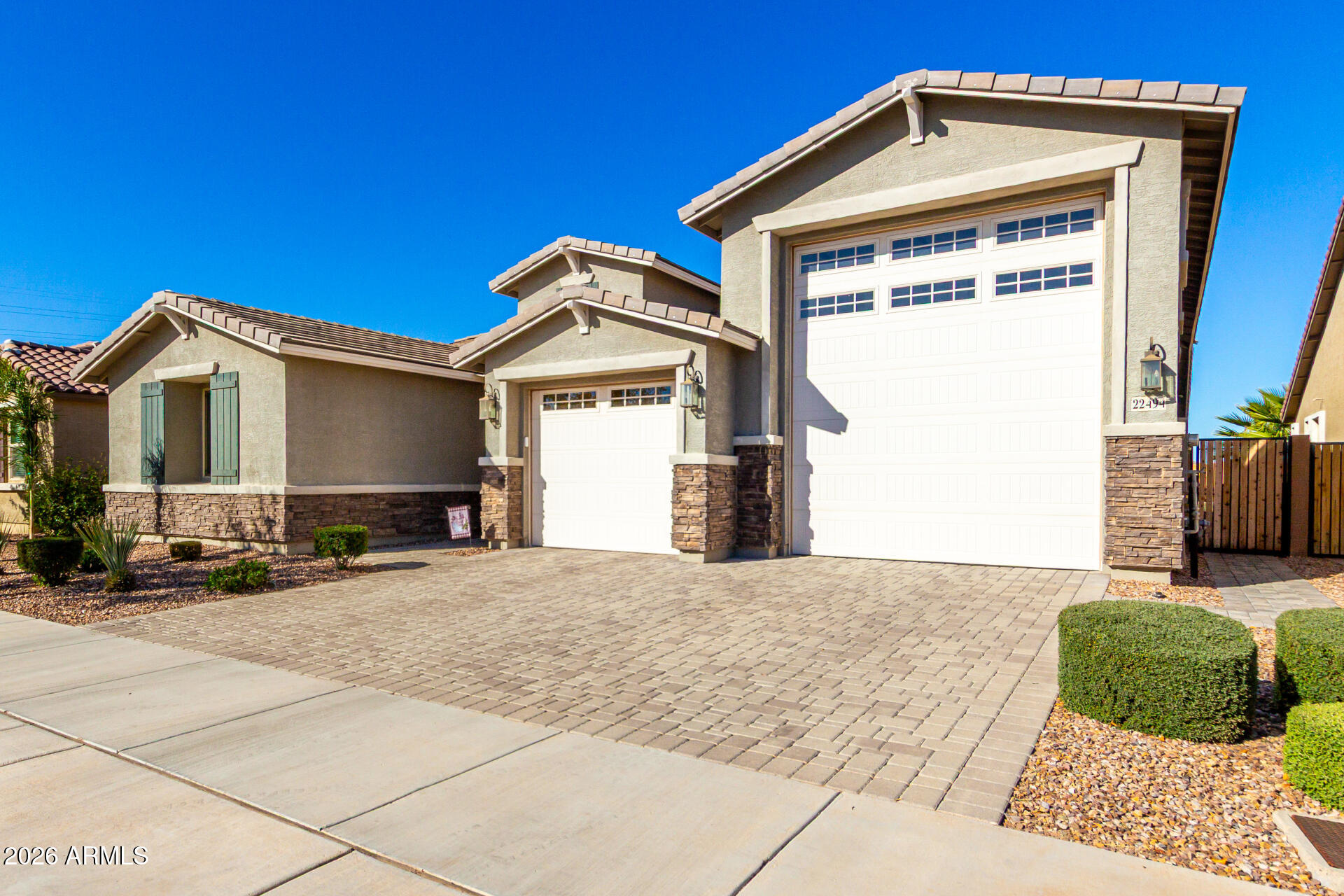 22494 East Russet Road Queen Creek, AZ 85142 - Photo 6 of 43 a front view of a house with a yard