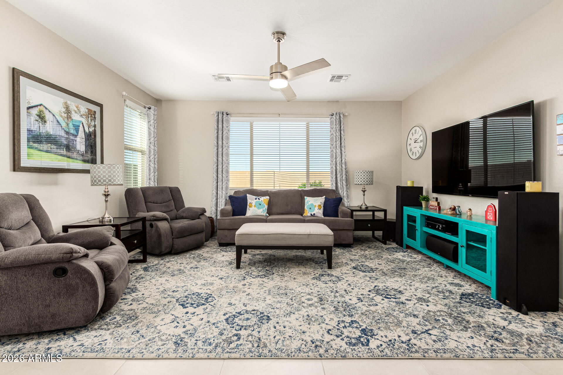 22494 East Russet Road Queen Creek, AZ 85142 - Photo 10 of 43 a living room with furniture and a flat screen tv