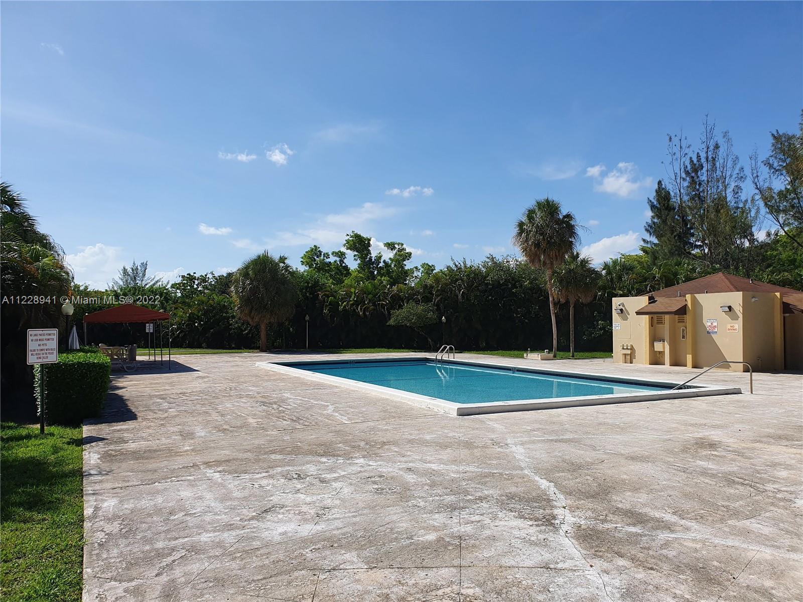 3490 Foxcroft Road, Unit B305 Miramar, FL 33025 - Photo 28 of 30 a view of backyard of the house