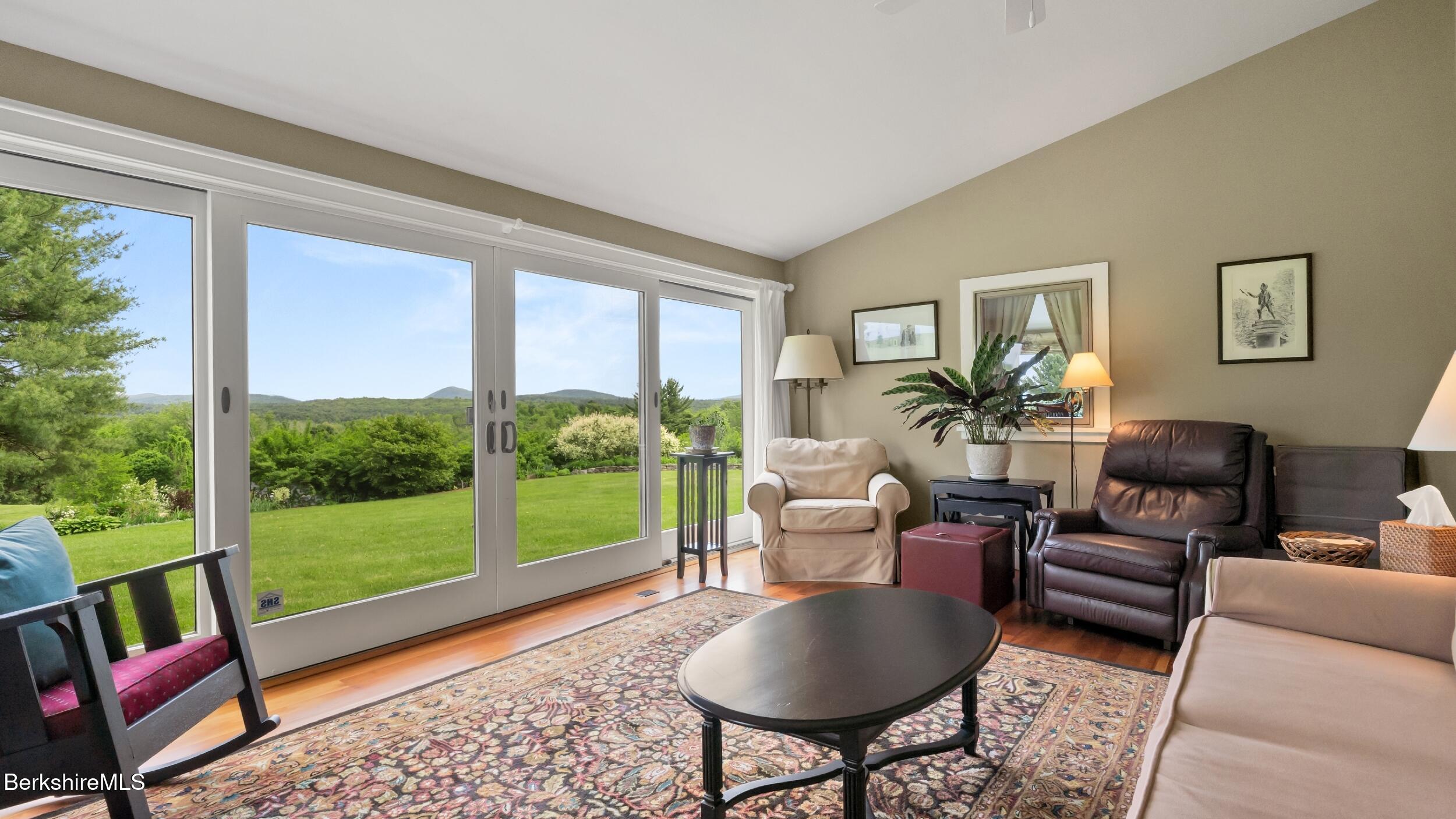 24 Baldwin Hill Road East Egremont, MA 01230 - Photo 20 of 47 a living room with furniture and a large window
