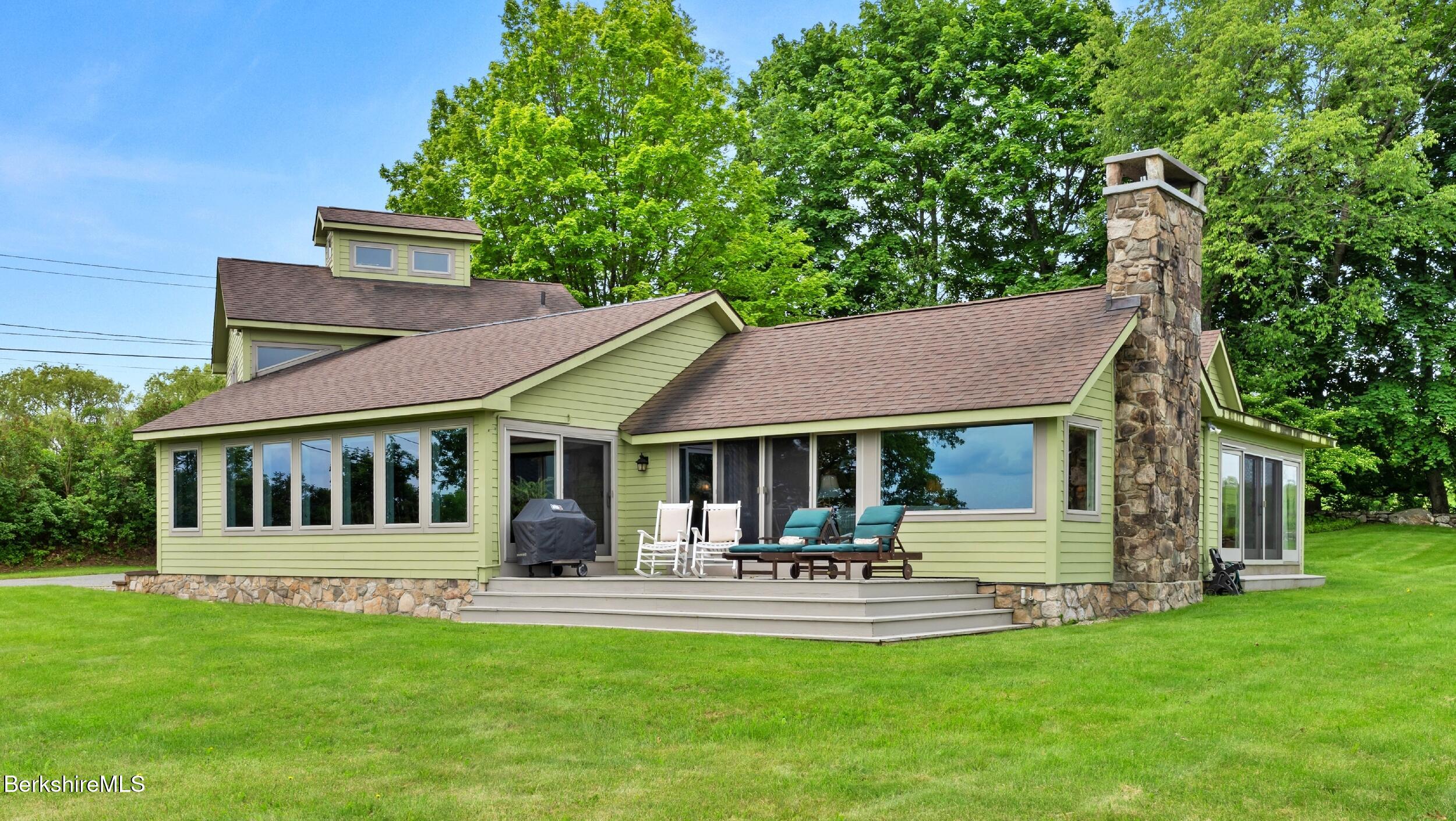 24 Baldwin Hill Road East Egremont, MA 01230 - Photo 2 of 47 a view of a house with a yard porch and sitting area