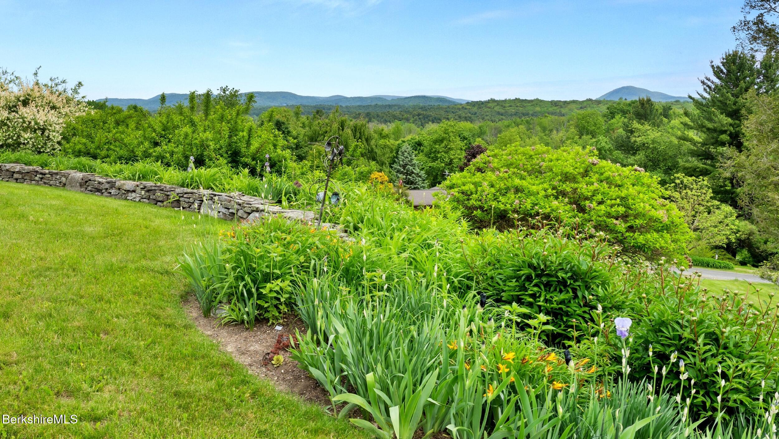 24 Baldwin Hill Road East Egremont, MA 01230 - Photo 37 of 47 a view of a lush green space with sea