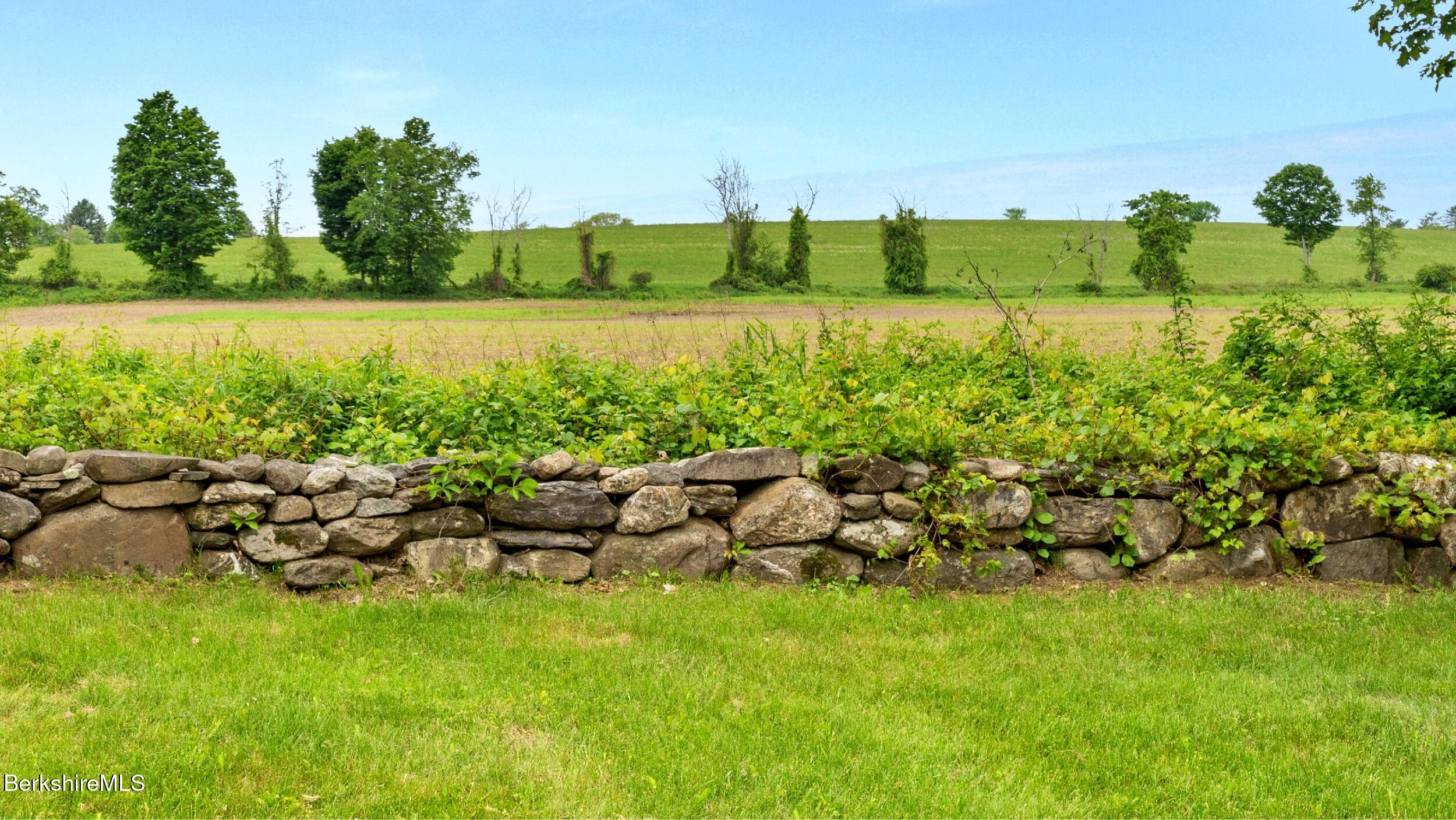 24 Baldwin Hill Road East Egremont, MA 01230 - Photo 40 of 47 a view of a bunch of trees and houses