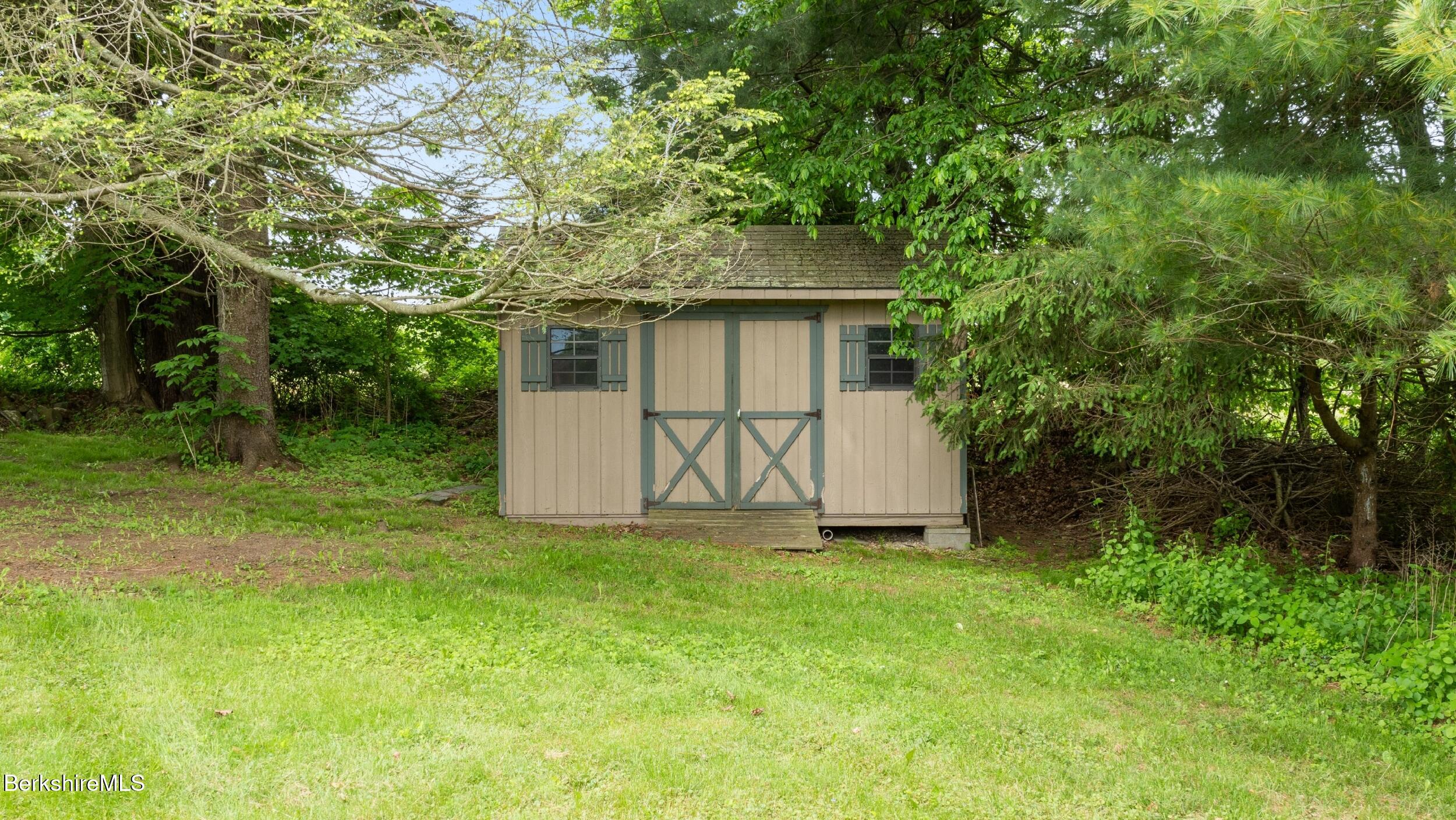 24 Baldwin Hill Road East Egremont, MA 01230 - Photo 42 of 47 a view of a house with a yard