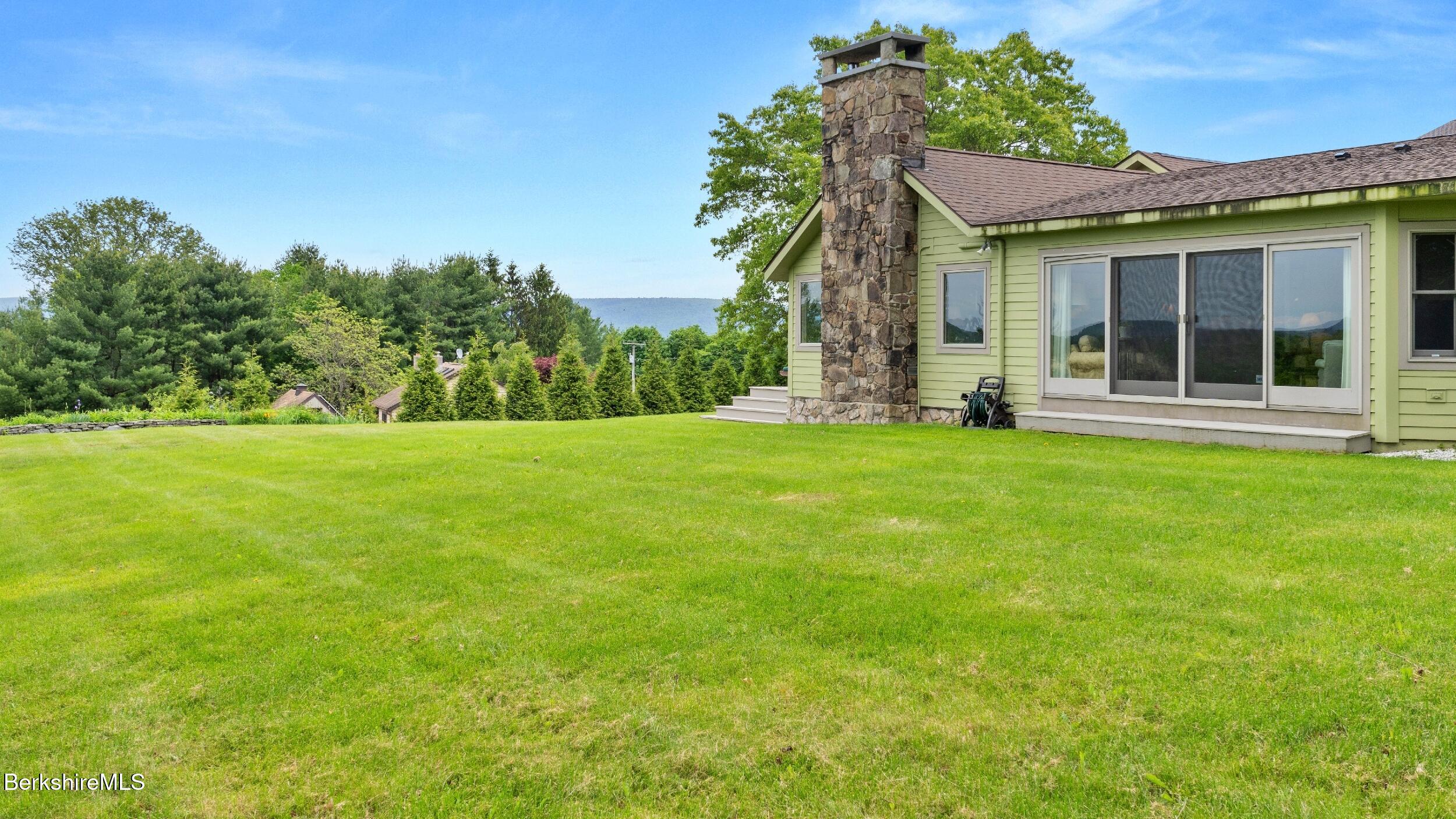 24 Baldwin Hill Road East Egremont, MA 01230 - Photo 45 of 47 a view of a house with a yard