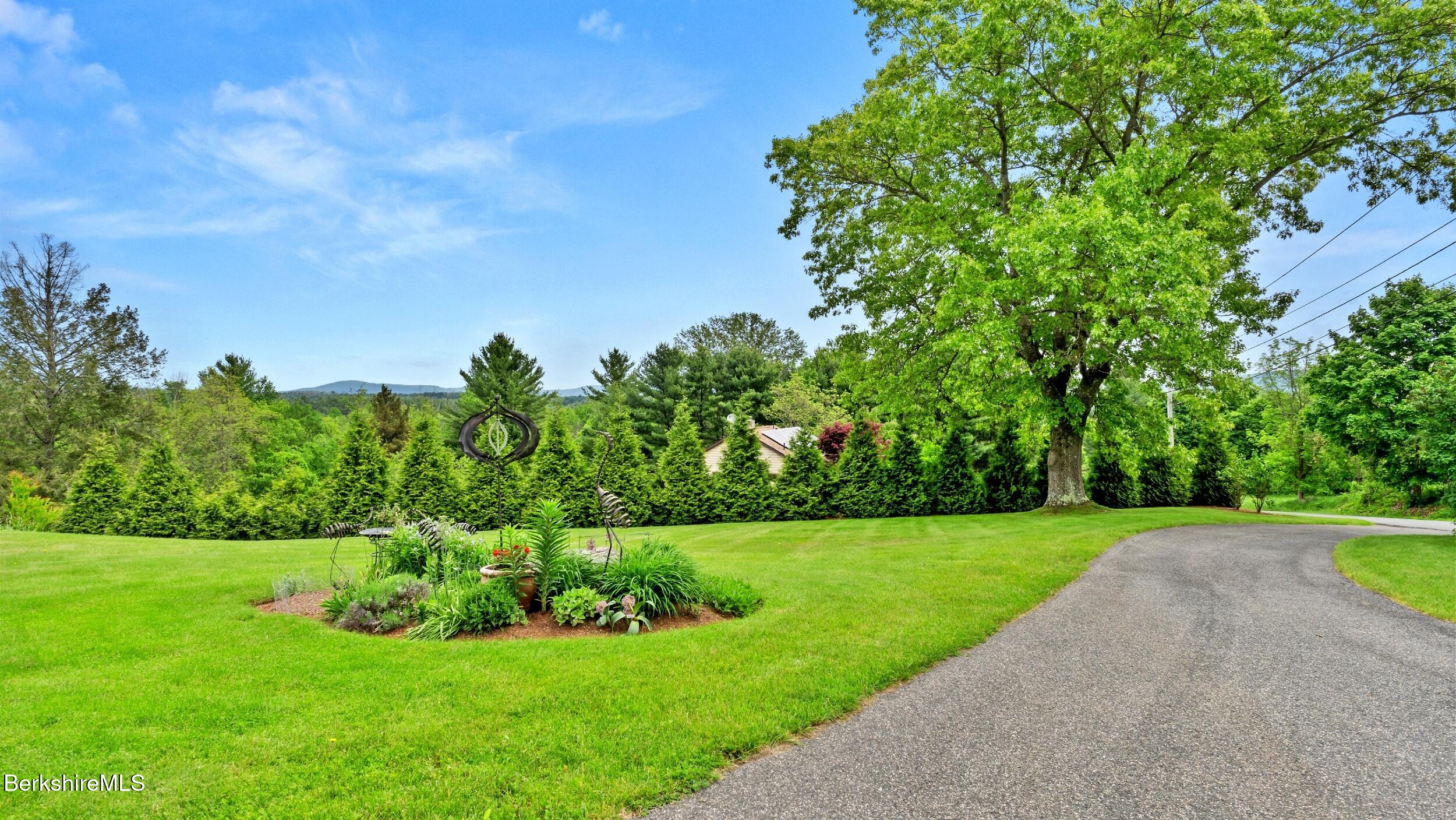 24 Baldwin Hill Road East Egremont, MA 01230 - Photo 46 of 47 a view of a garden with large trees