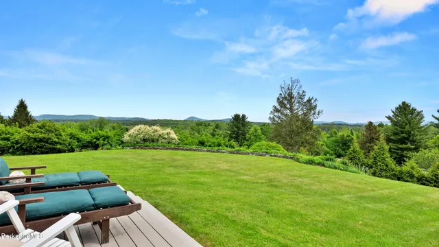 a view of a yard with furniture