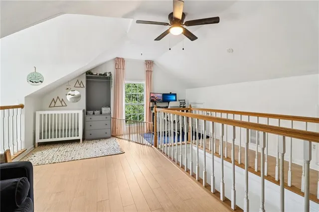 a view of a hallway with a livingroom