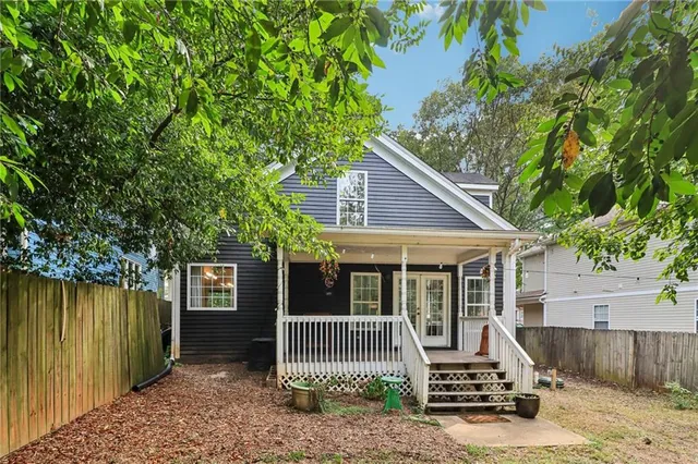 a front view of a house with a garage