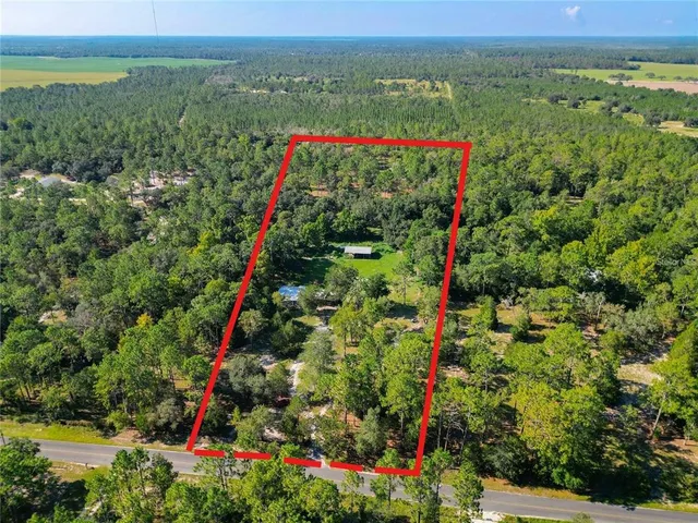 a view of a outdoor space with a lake view