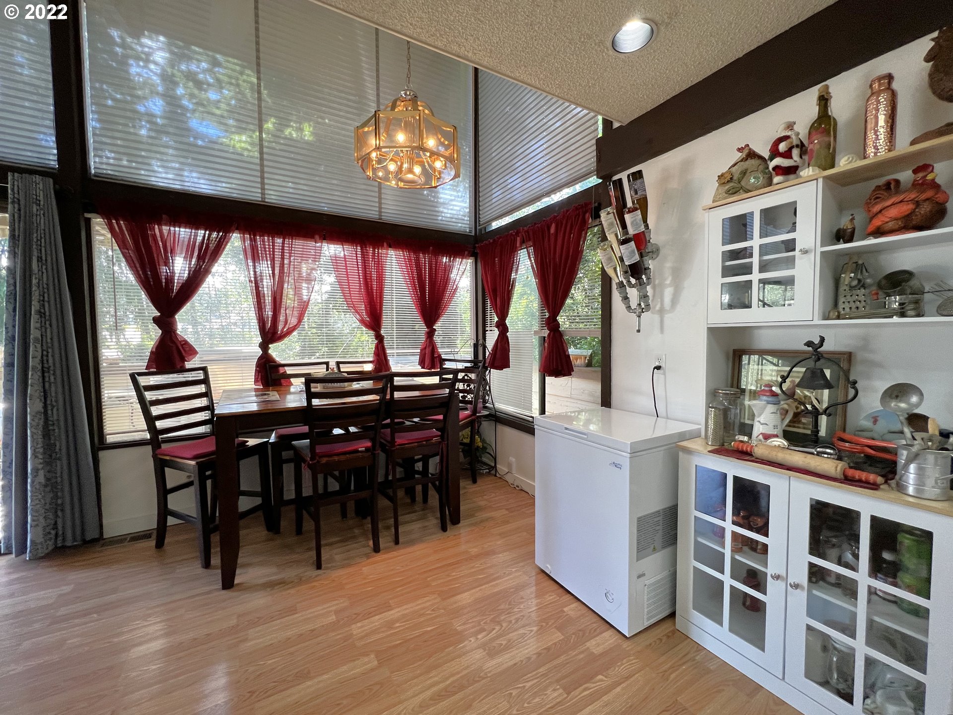 2690 Everett Avenue North Bend, OR 97459 - Photo 12 of 32 a view of a dining room with furniture and chandelier