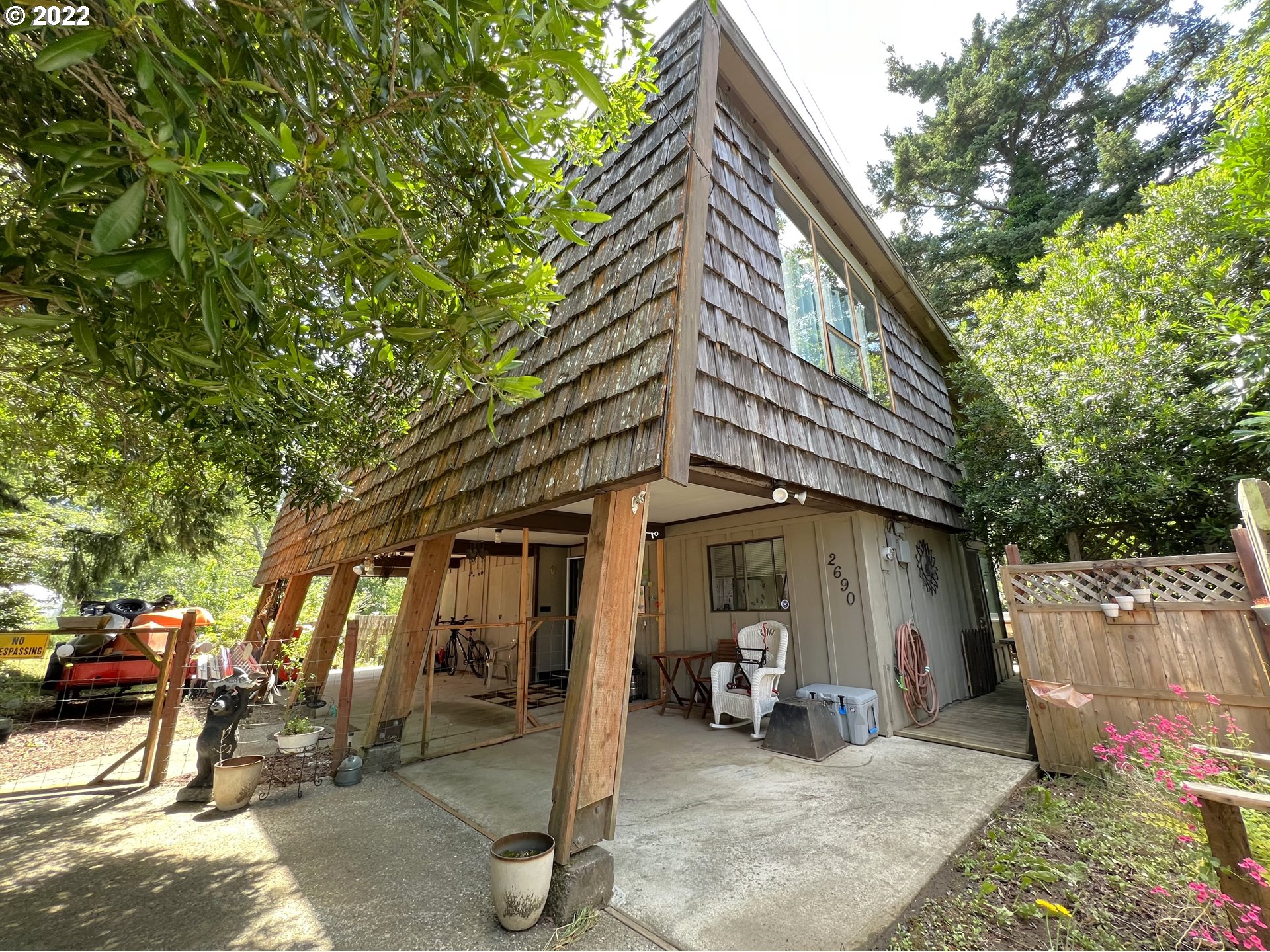 2690 Everett Avenue North Bend, OR 97459 - Photo 25 of 32 a view of a house with a patio