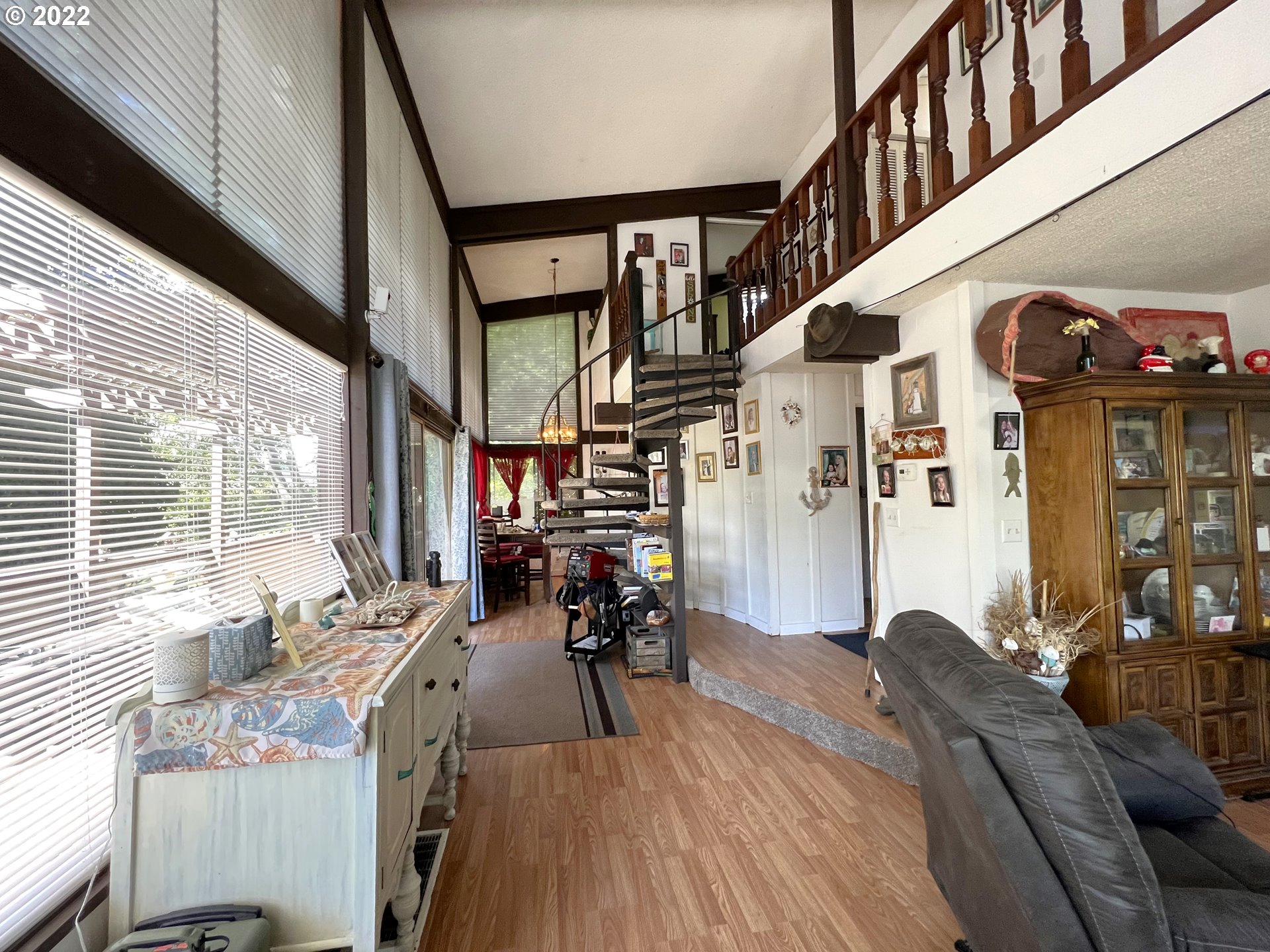 2690 Everett Avenue North Bend, OR 97459 - Photo 7 of 32 a view of a dining room with furniture window and wooden floor