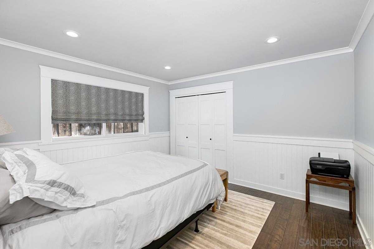 5524 Candlelight Drive La Jolla, CA 92037 - Photo 20 of 27 a bedroom with a bed and a window