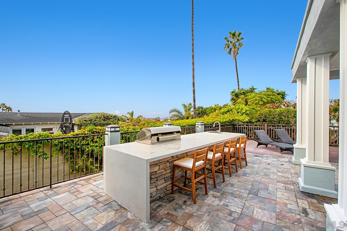 5524 Candlelight Drive La Jolla, CA 92037 - Photo 24 of 27 a view of a terrace with furniture