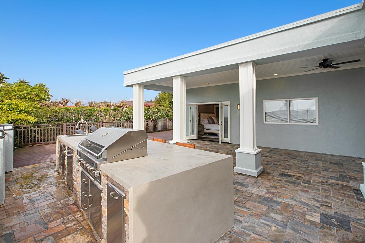 5524 Candlelight Drive La Jolla, CA 92037 - Photo 25 of 27 a view of a house with backyard