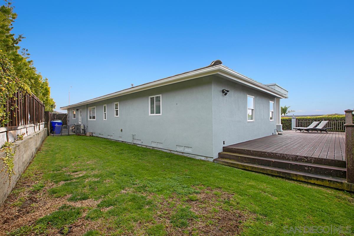 5524 Candlelight Drive La Jolla, CA 92037 - Photo 26 of 27 a front view of a house with a yard