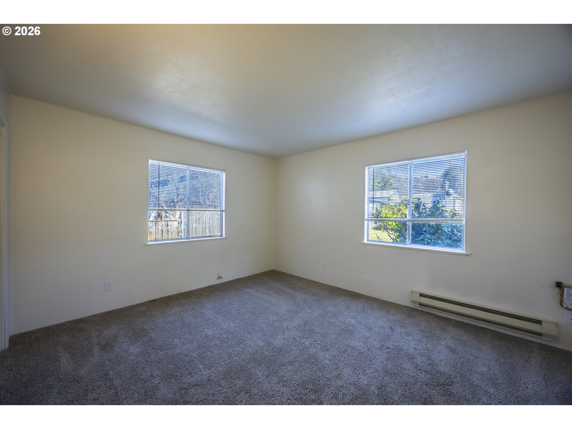 550 North 8th Street Lakeside, OR 97449 - Photo 18 of 31 an empty room with windows