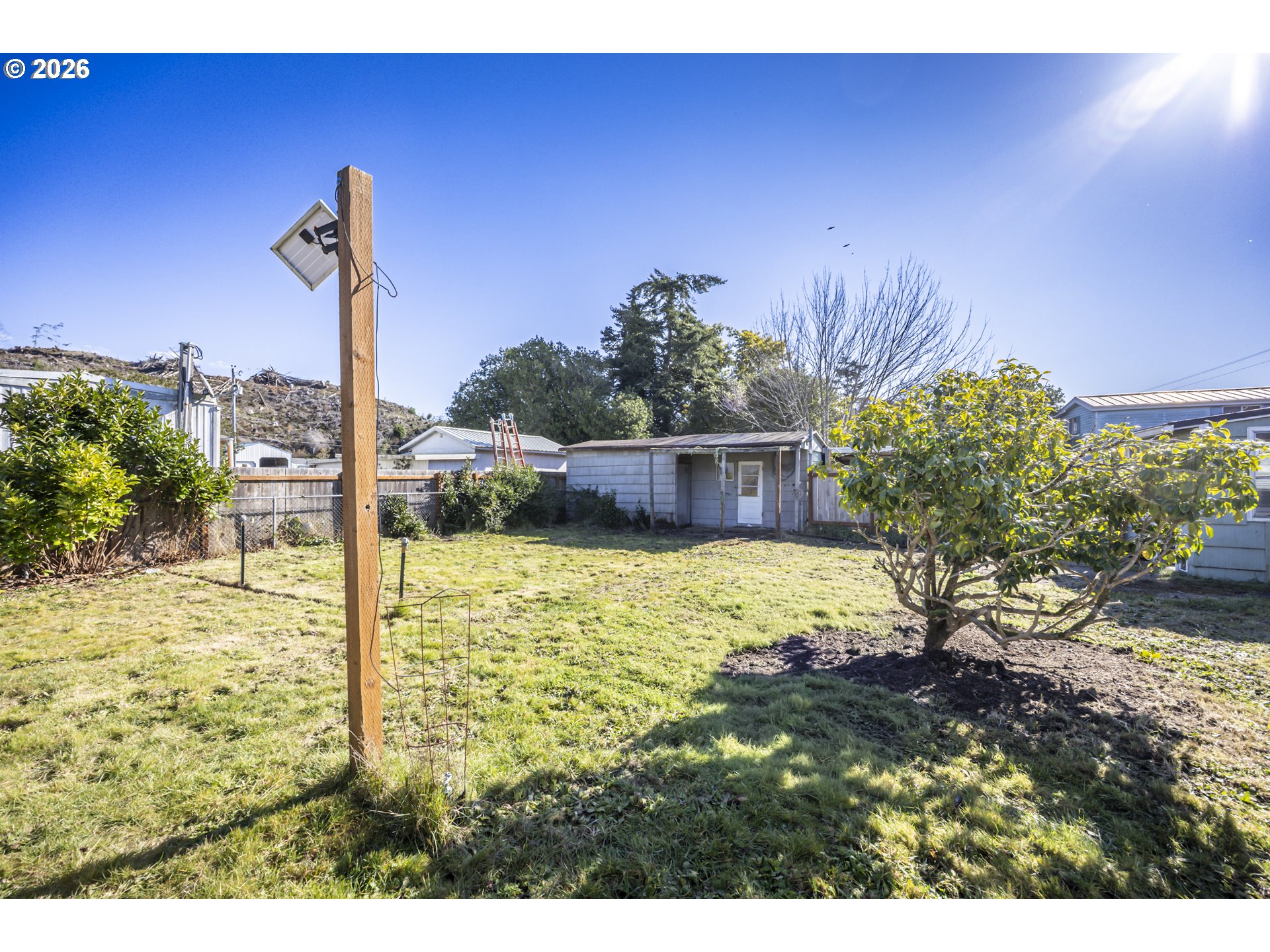 550 North 8th Street Lakeside, OR 97449 - Photo 24 of 31 a view of a yard