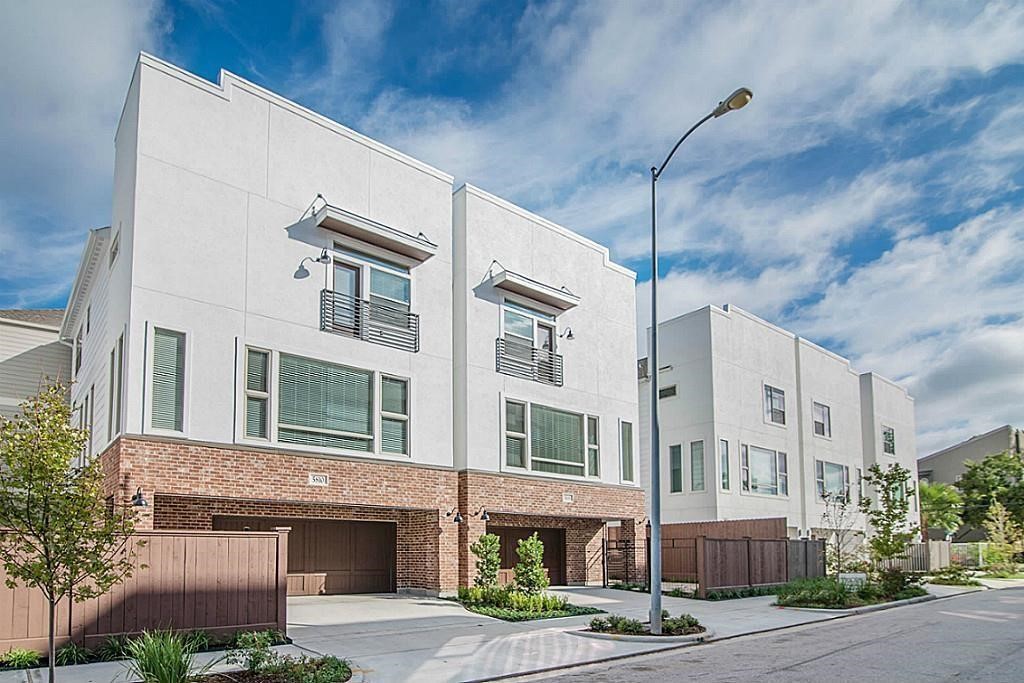 5810 Venice Street Houston, TX 77007 - Photo 1 of 31 a city view with tall buildings and a street