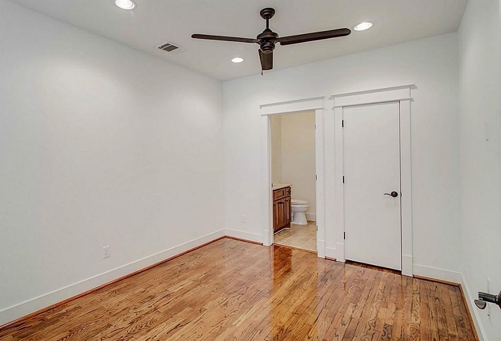 5810 Venice Street Houston, TX 77007 - Photo 12 of 31 a view of empty room with wooden floor