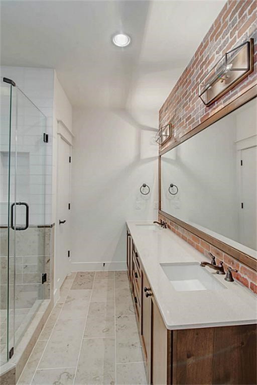 5810 Venice Street Houston, TX 77007 - Photo 16 of 31 a bathroom with a sink and a mirror