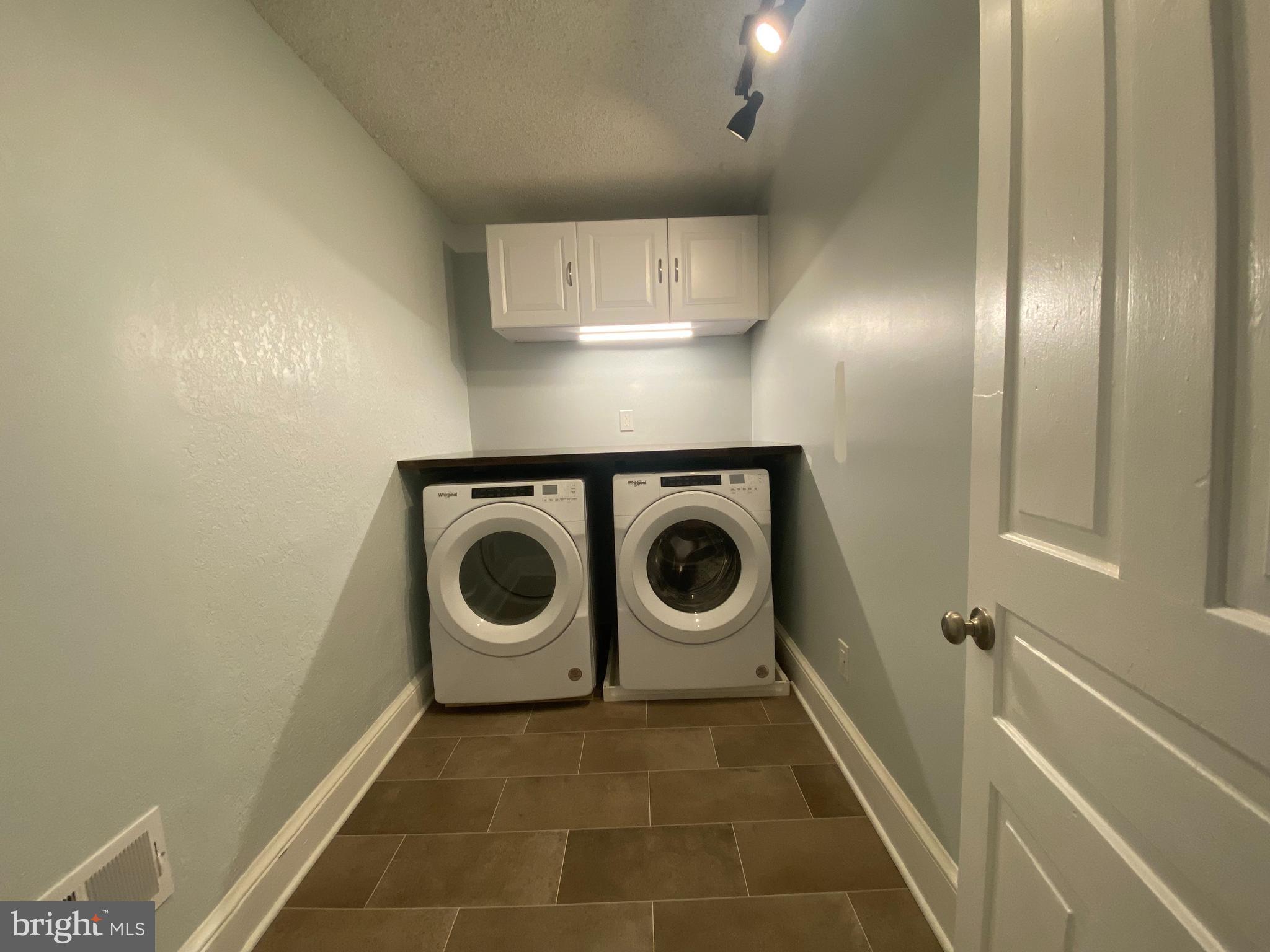 249 North Marshall Street Lancaster, PA 17602 - Photo 9 of 15 a utility room with dryer and washer