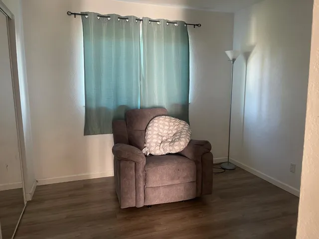 a view of entryway with wooden floor