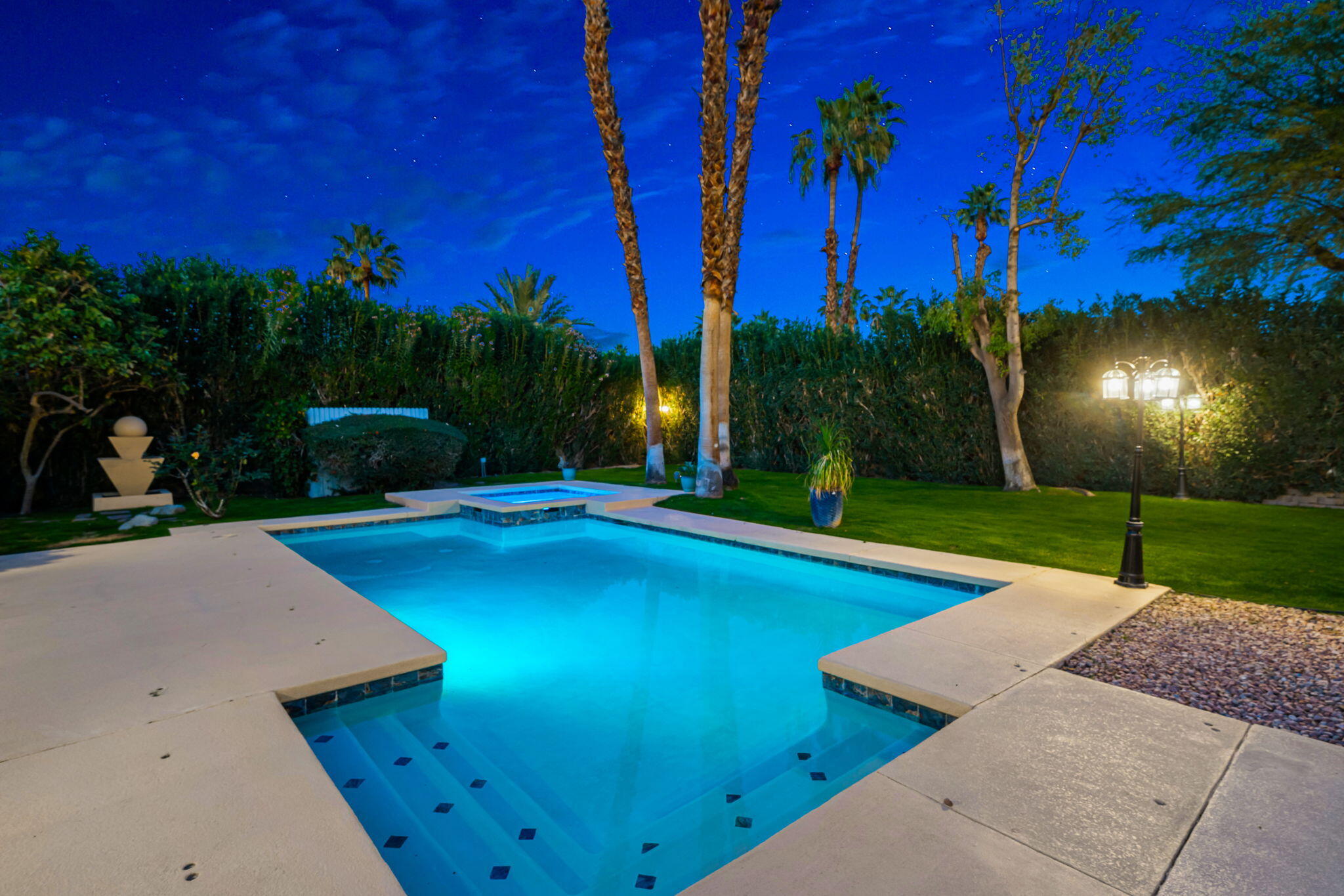 39790 Regency Way Palm Desert, CA 92211 - Photo 13 of 59 a view of a backyard with a house