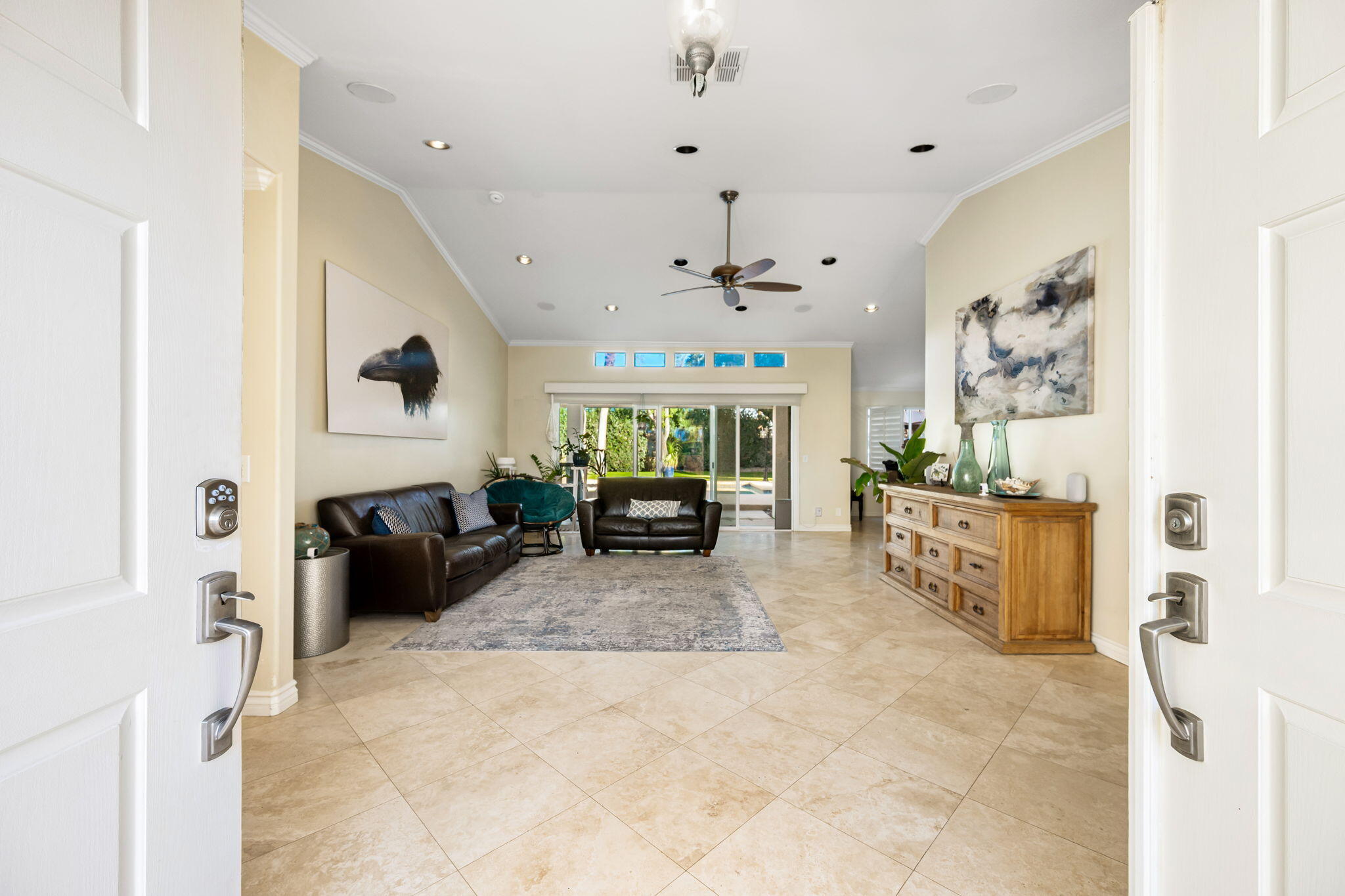 39790 Regency Way Palm Desert, CA 92211 - Photo 23 of 59 a living room with furniture and a flat screen tv