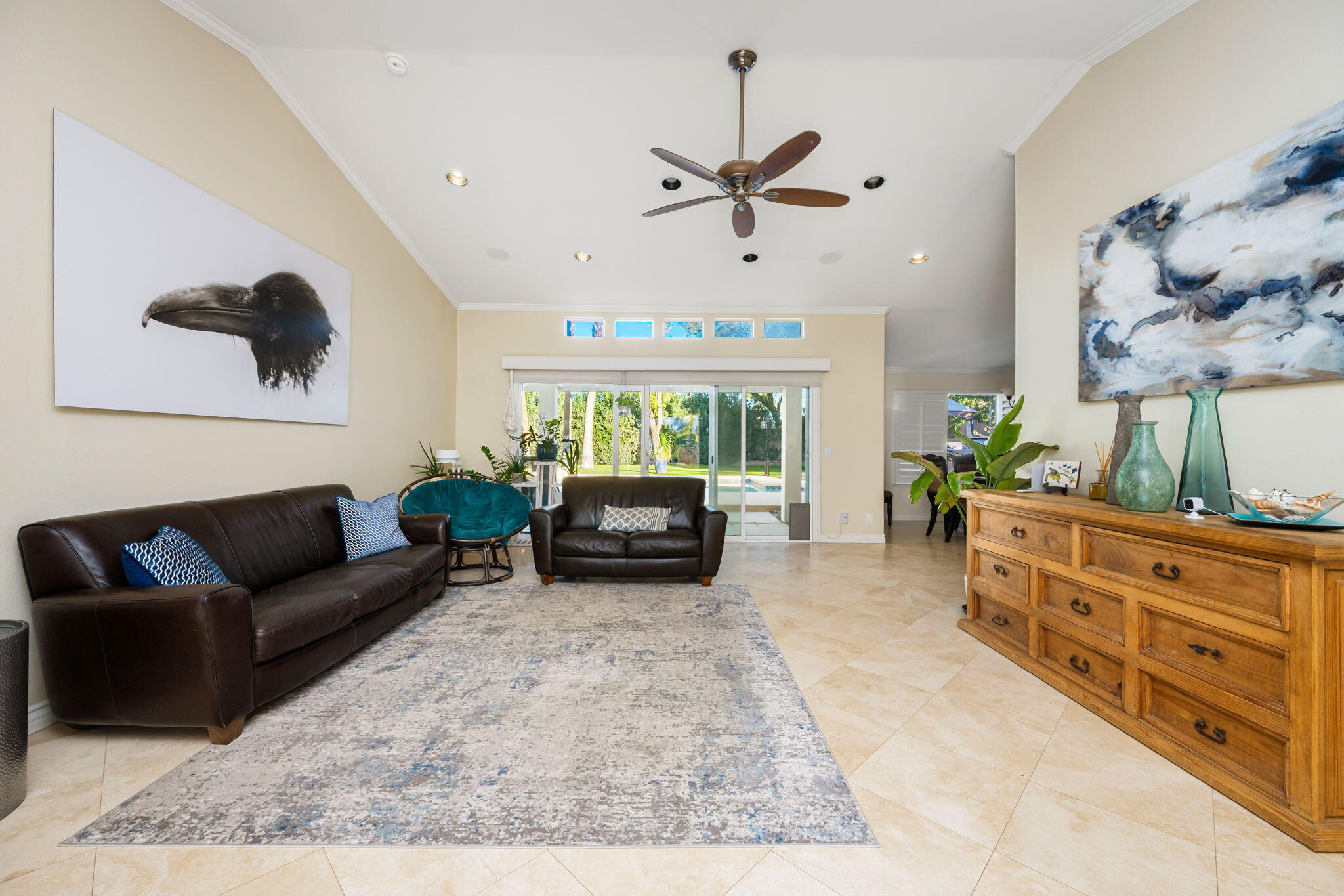 39790 Regency Way Palm Desert, CA 92211 - Photo 24 of 59 a living room with furniture and a large window