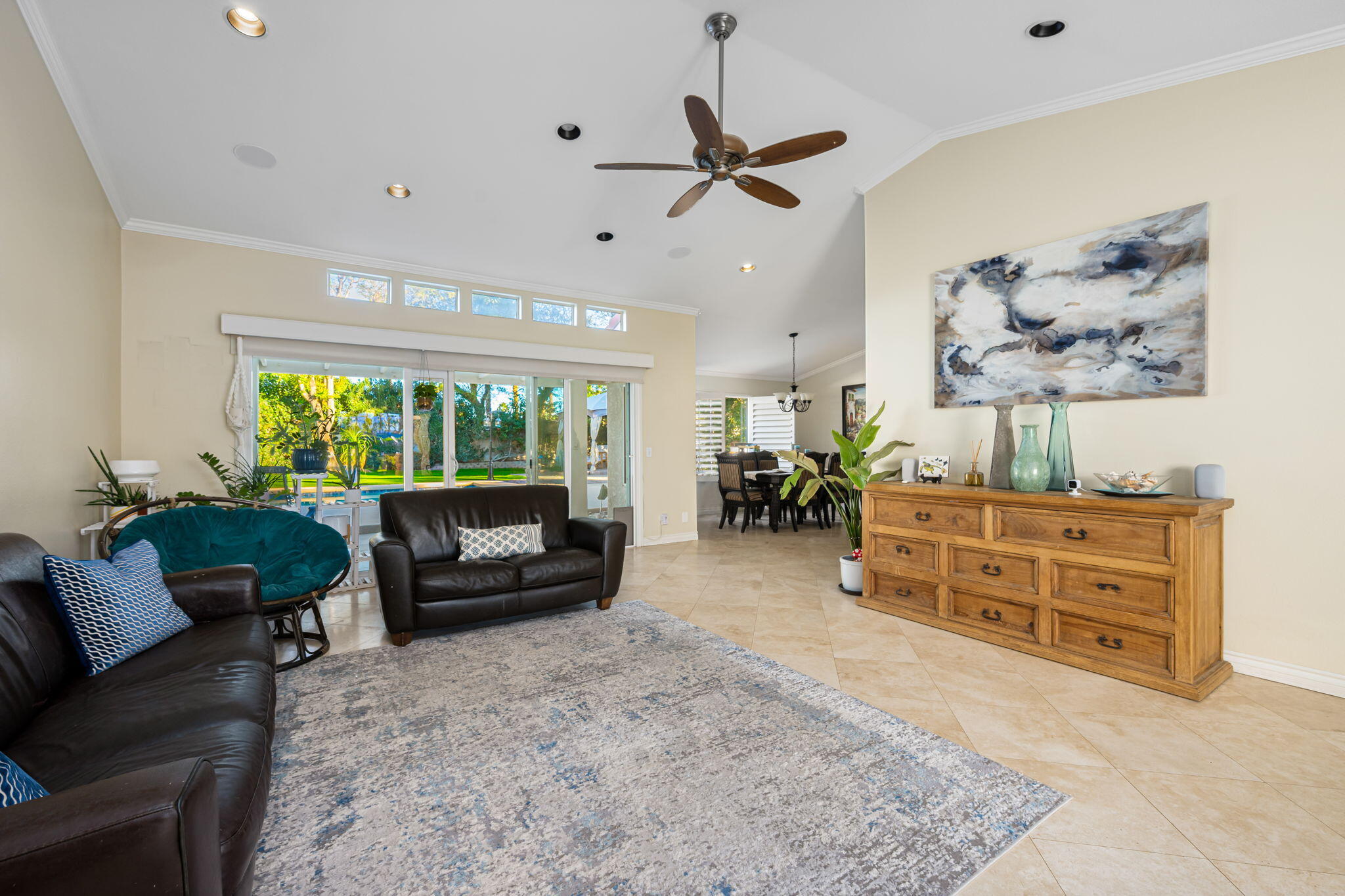 39790 Regency Way Palm Desert, CA 92211 - Photo 25 of 59 a living room with furniture and a large window