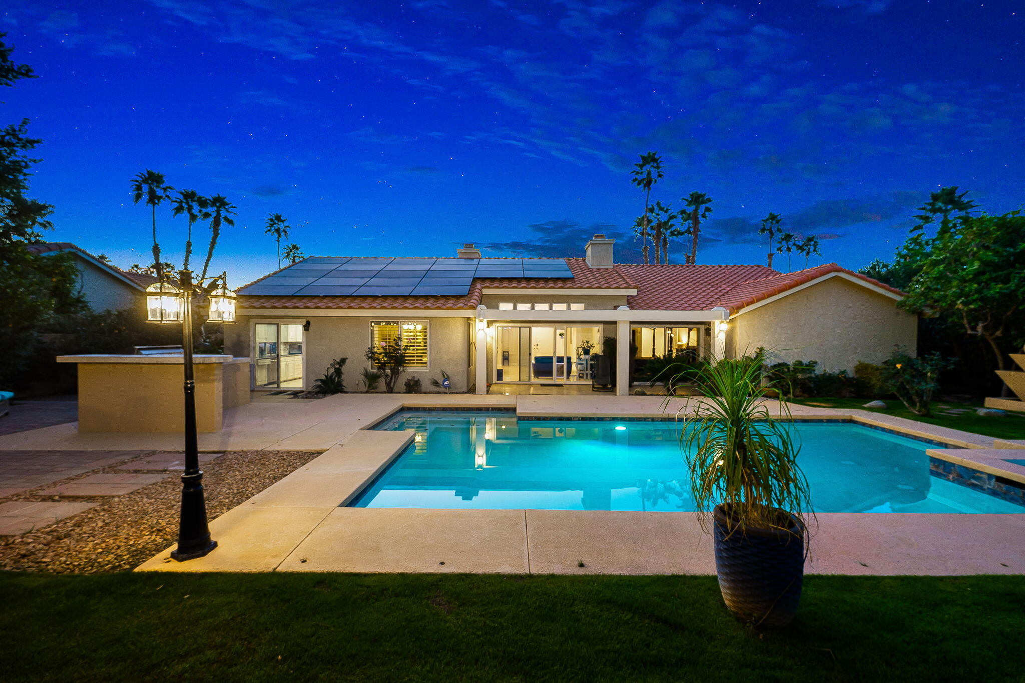 39790 Regency Way Palm Desert, CA 92211 - Photo 3 of 59 a front view of a house with garden