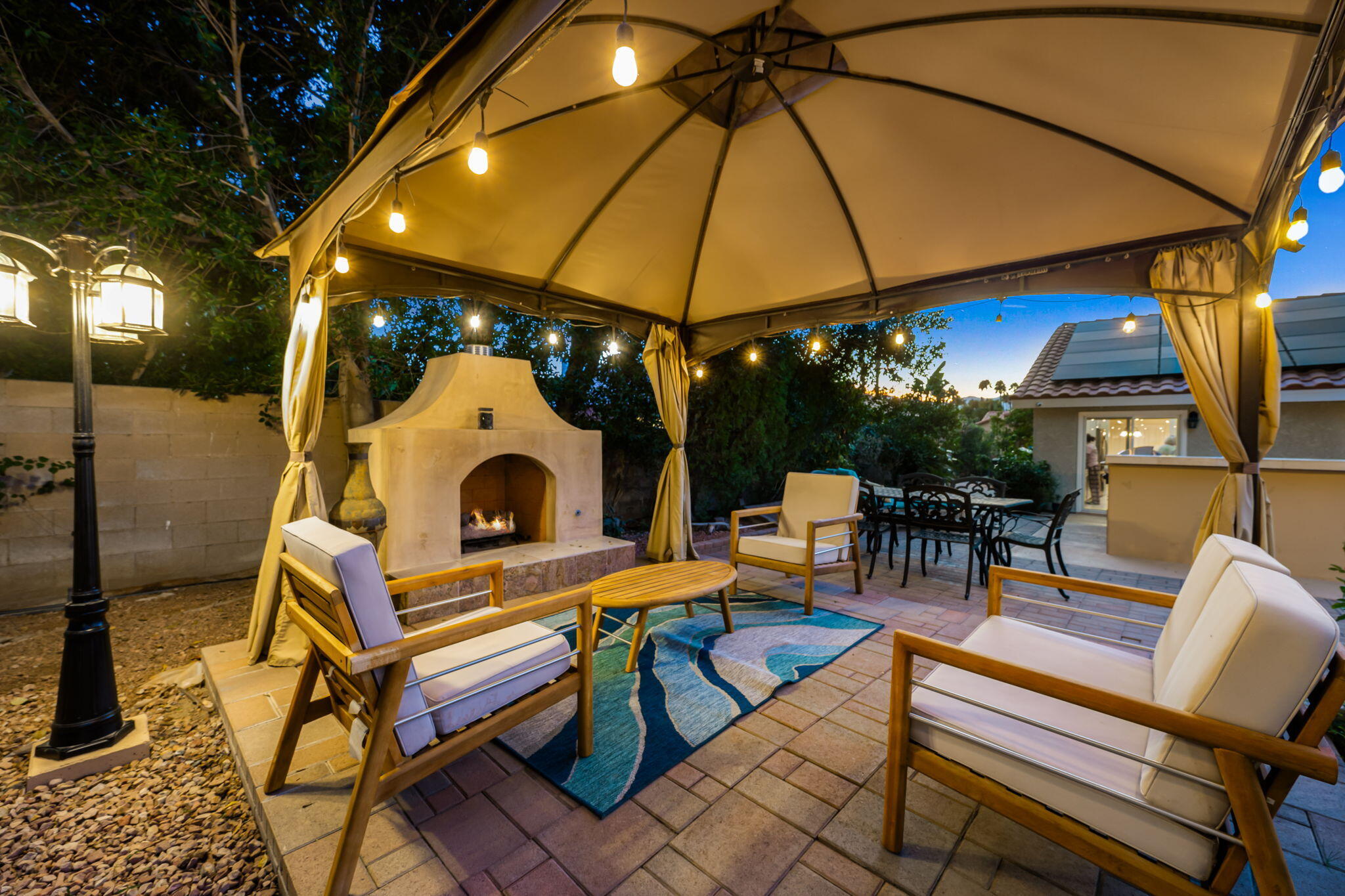 39790 Regency Way Palm Desert, CA 92211 - Photo 34 of 59 a outdoor space with patio a patio and a fireplace