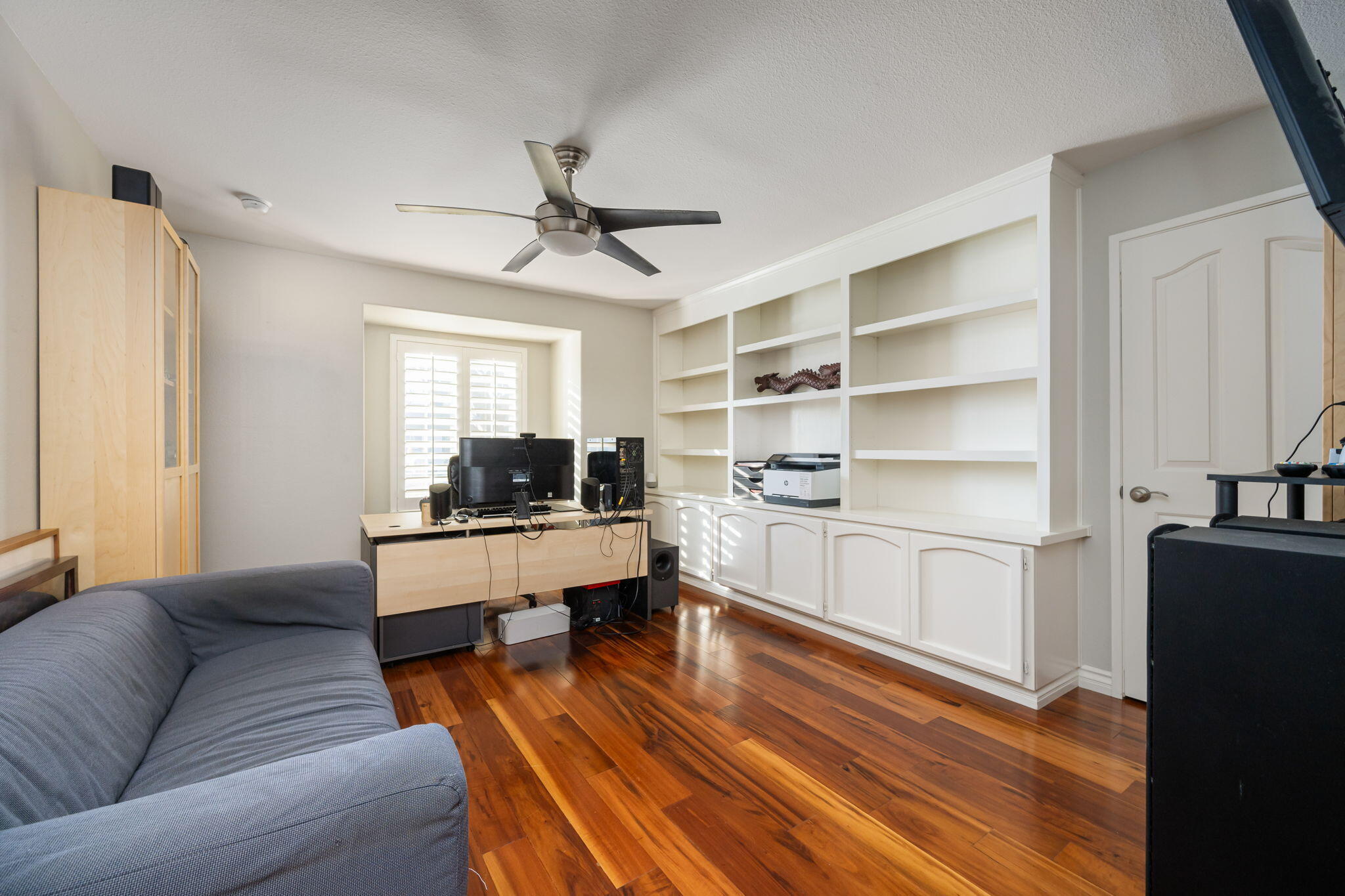 39790 Regency Way Palm Desert, CA 92211 - Photo 48 of 59 a living room with furniture and a wooden floor