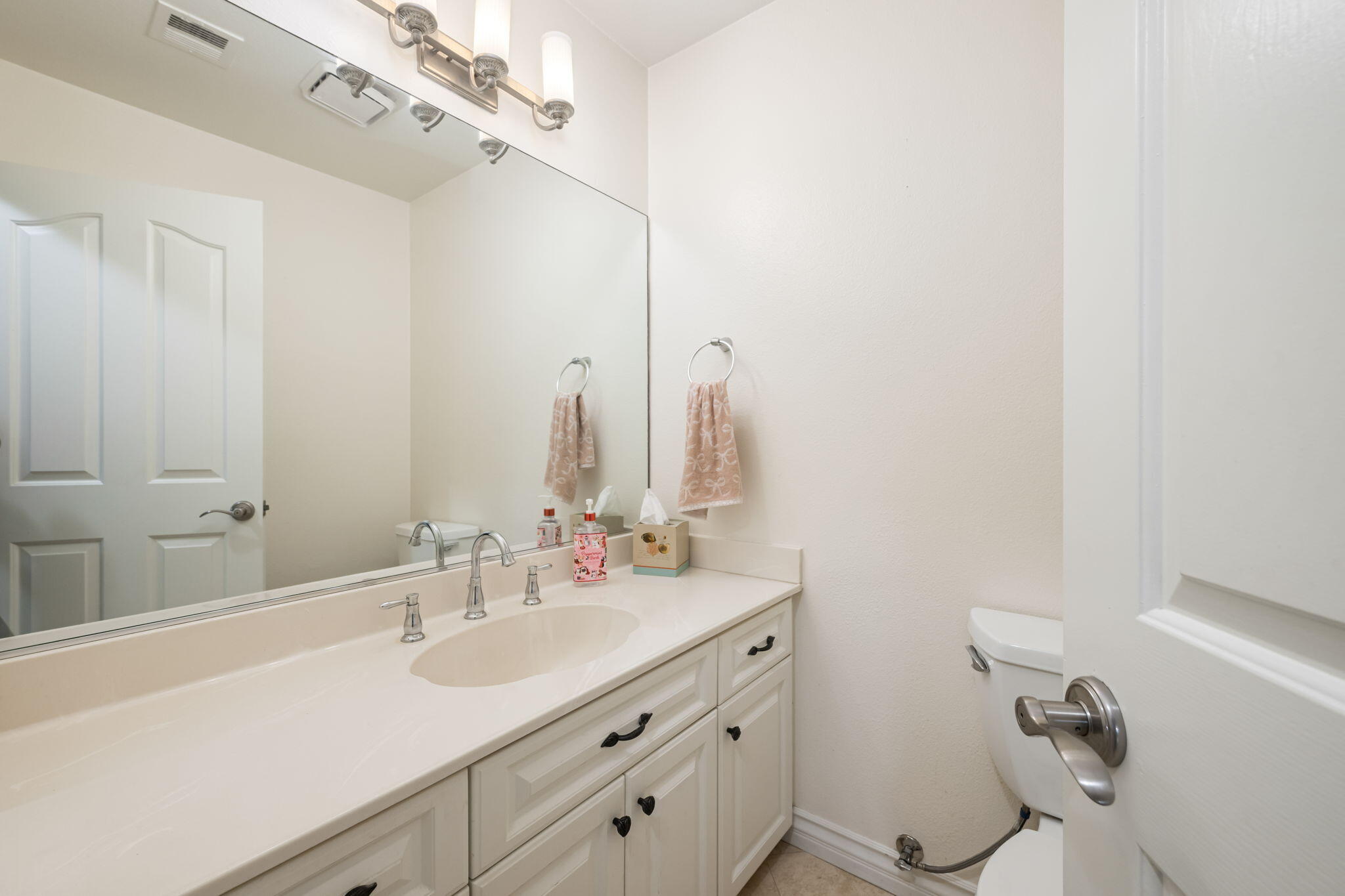 39790 Regency Way Palm Desert, CA 92211 - Photo 58 of 59 a bathroom with a sink double vanity and a mirror