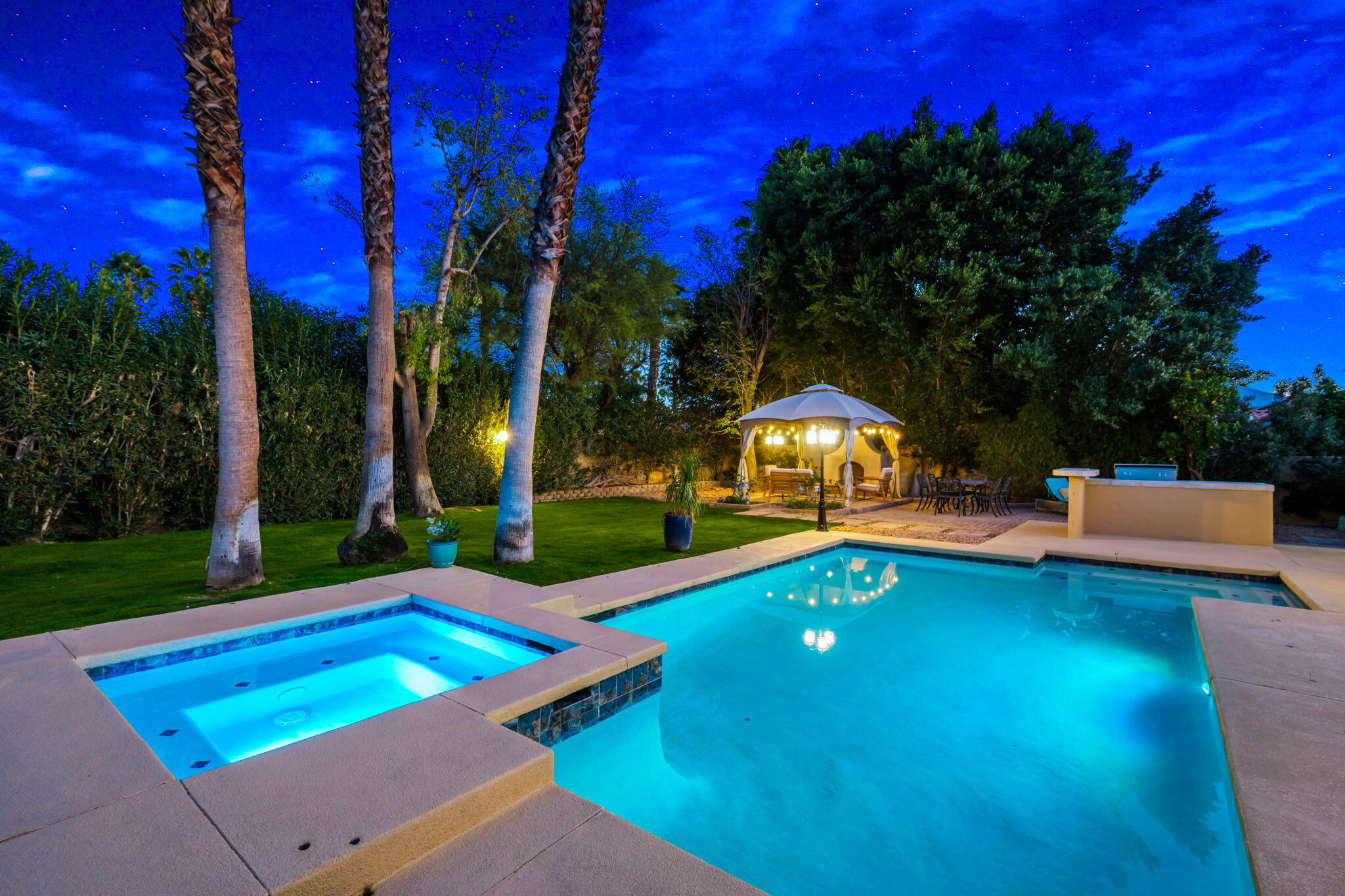 39790 Regency Way Palm Desert, CA 92211 - Photo 8 of 59 a view of a backyard with swimming pool