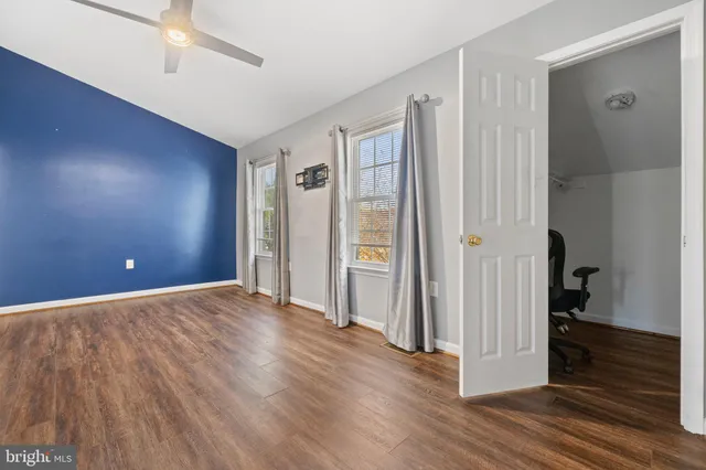 a view of entryway with wooden floor