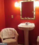 4085 Sumerduck Road Sumerduck, VA 22742 - Photo 54 of 83 a bathroom with a sink and a mirror