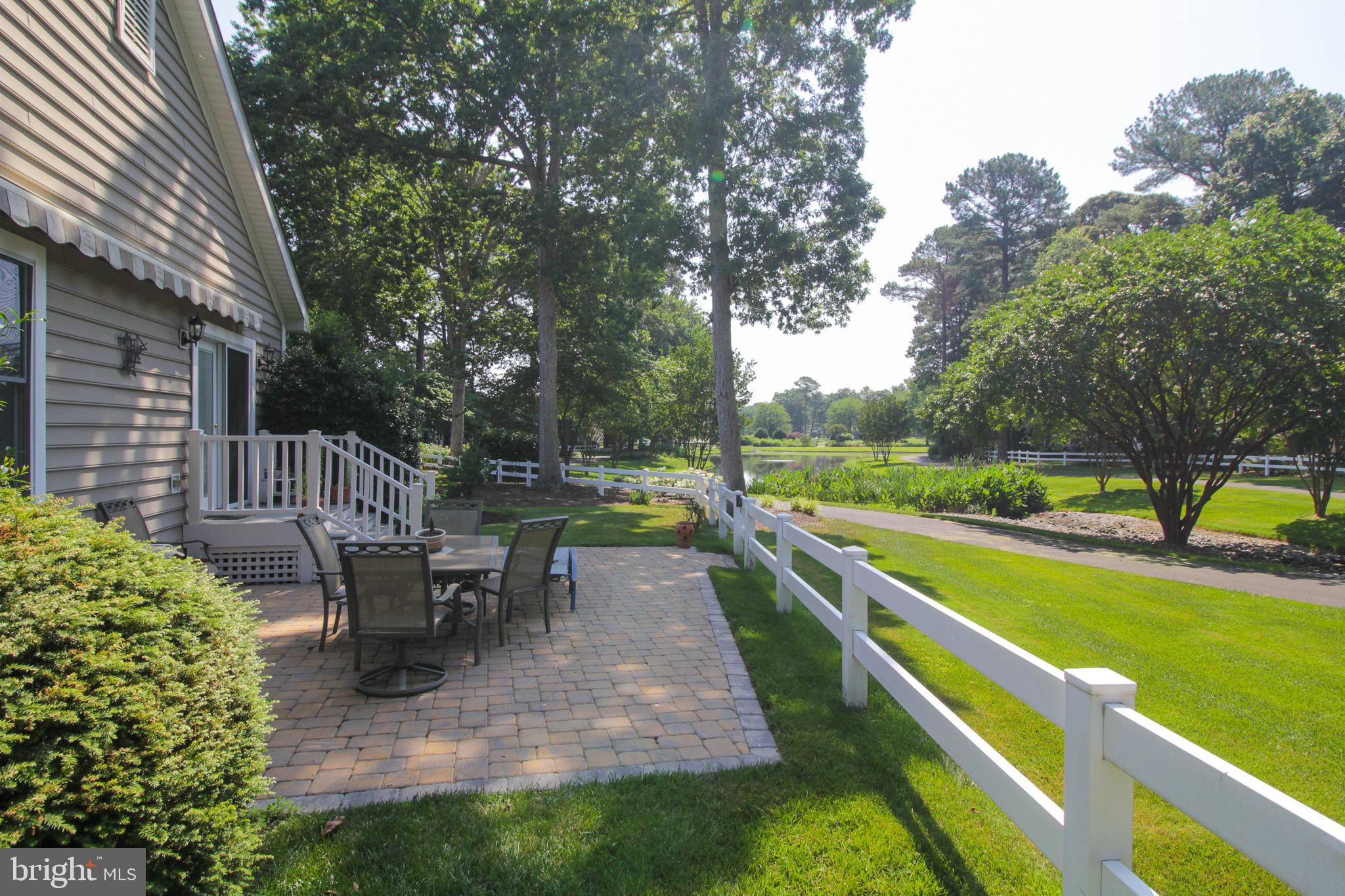 32464 Approach Way, Unit 3278 Millsboro, DE 19966 - Photo 6 of 47 a view of a house with backyard and sitting area