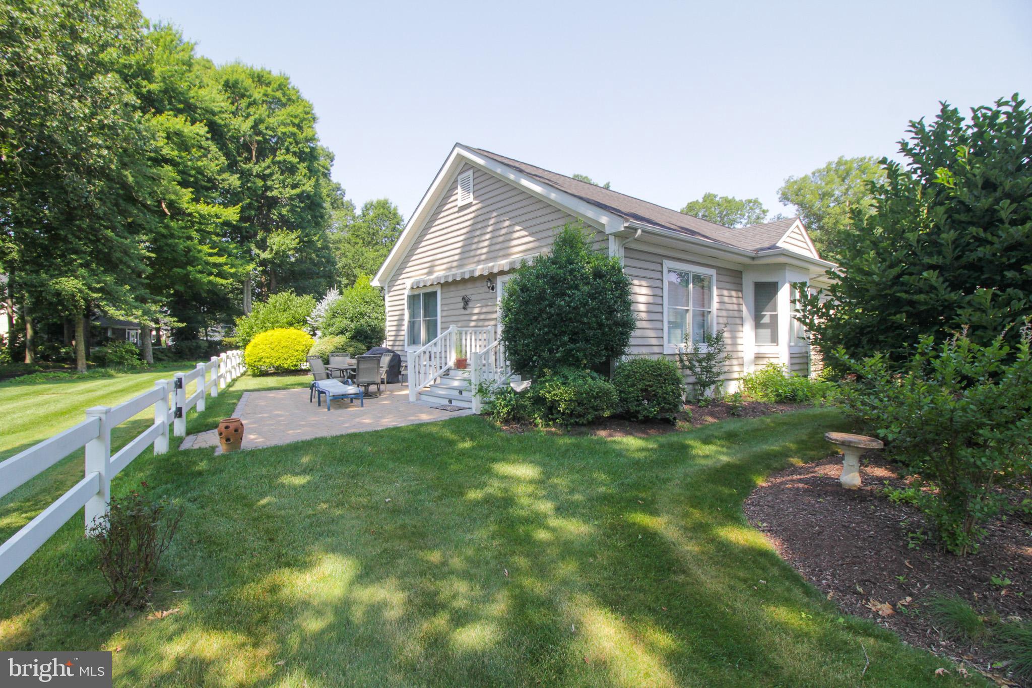 32464 Approach Way, Unit 3278 Millsboro, DE 19966 - Photo 9 of 47 a view of backyard of house with green space